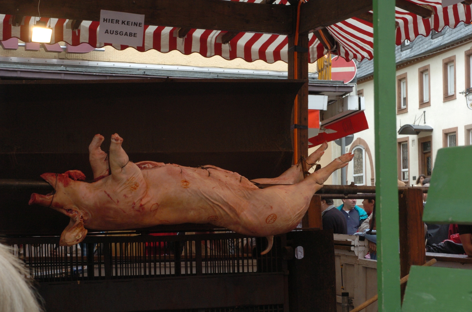 More than 100 pigs are roasted on the spits during the annual pig festival. Although there are numerous booths offering a variety of traditional food items, the Schweinebraten, or barbecued pork is a special treat at the event.  (U.S. Air Force photo/Iris Reiff)