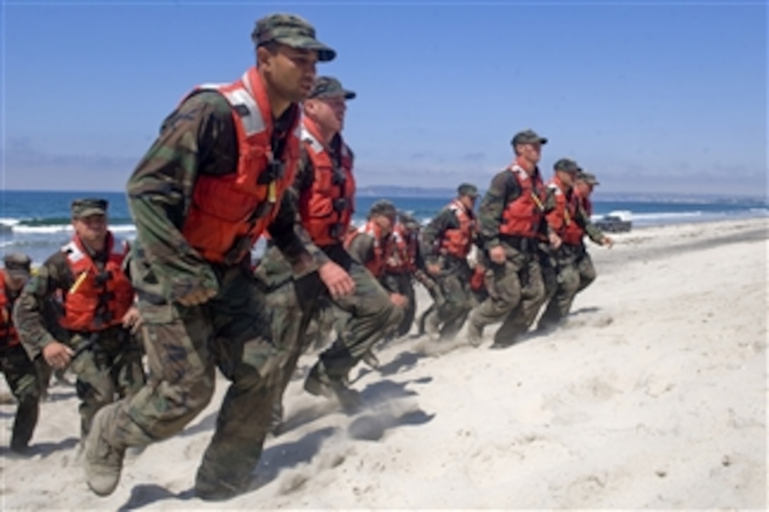 U.S. Navy SEAL candidates from class 284 participate in Hell Week at the Naval Special Warfare Center at Naval Amphibious Base Coronado in San Diego, Calif., on Aug. 13, 2010.  