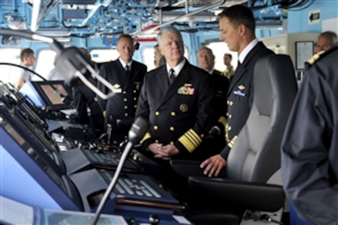 U.S. Navy Adm. Gary Roughead, center, chief of Naval Operations, tours the bridge of the Norwegian Navy Nansen-class frigate HNoMS Otto Svedrup during a counterpart visit to Haakonsvern Naval Base in Bergen, Norway, Aug. 16, 2010.