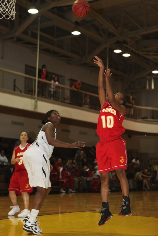 Veronica Polston shoots for two more points in the 2010 Armed Forces Basketball Tournament held at Joint Base Myer-Henderson Hall Aug. 18, 2010. The women’s All-Marine basketball team has struggled to overcome defeat with three of their starters out due to injuries.