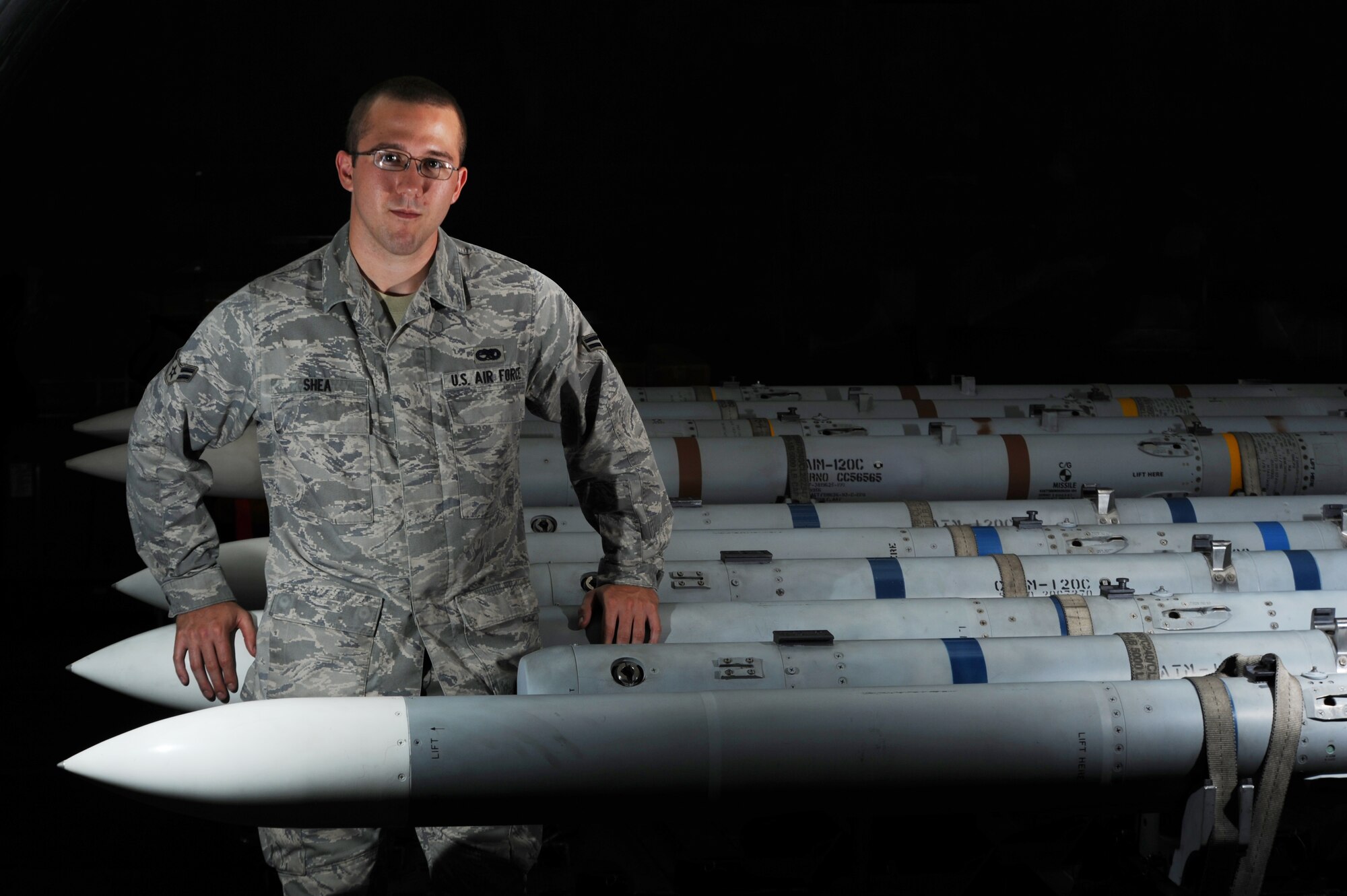 Airman 1st Class Daniel Shea, 15th Maintenance Squadron munitions material section apprentice, is this week’s Hickam Warrior. Airman Shea is responsible for monitoring the condition of a 20 million dollar munitions stockpile. He also is responsible for maintaining two above ground storage magazines. Airman Shea performs periodic inspections on munitions assets. Airman Shea enjoys working out, watching movies, and is and is an avid Frisbee enthusiast. (U.S. Air Force graphic by Staff Sgt. Nathan Allen) 