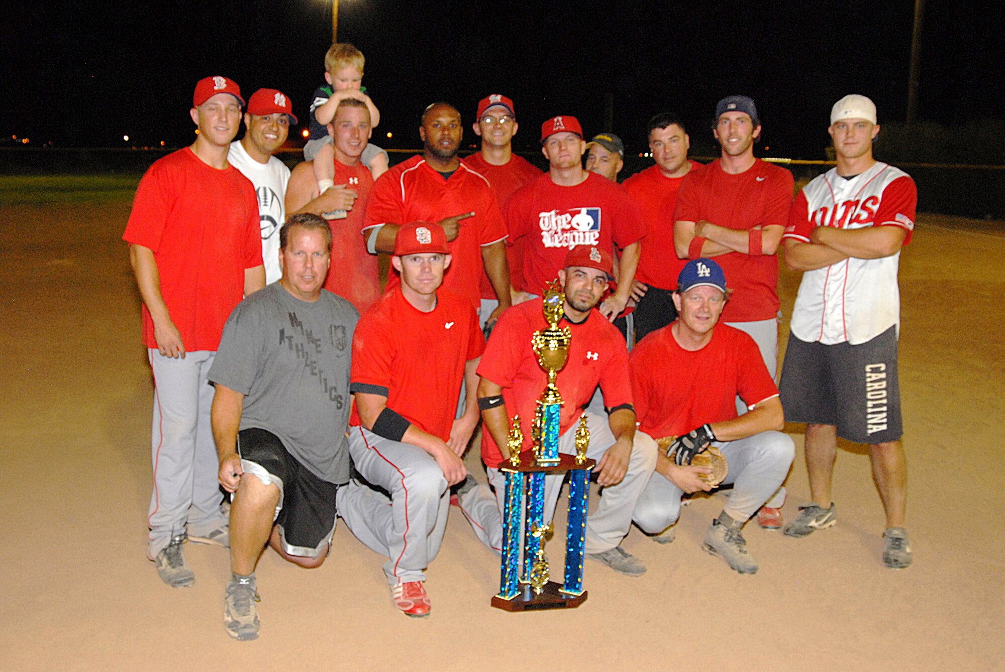 The 412th Maintenance Squadron's AMMO softball team is this year's Edwards intramural softball champions.  They advanced to the championship game by defeating the 31st Test and Evaluation Squadron in the losers bracket and then beating last year's intramural softball champion, the 95th Medical Group, Aug. 16. Chris Hug, sports director, says this year's intramural softball season was a success with 16 teams participating. (Air Force photo by Staff Sgt. Angelique Smythe)
