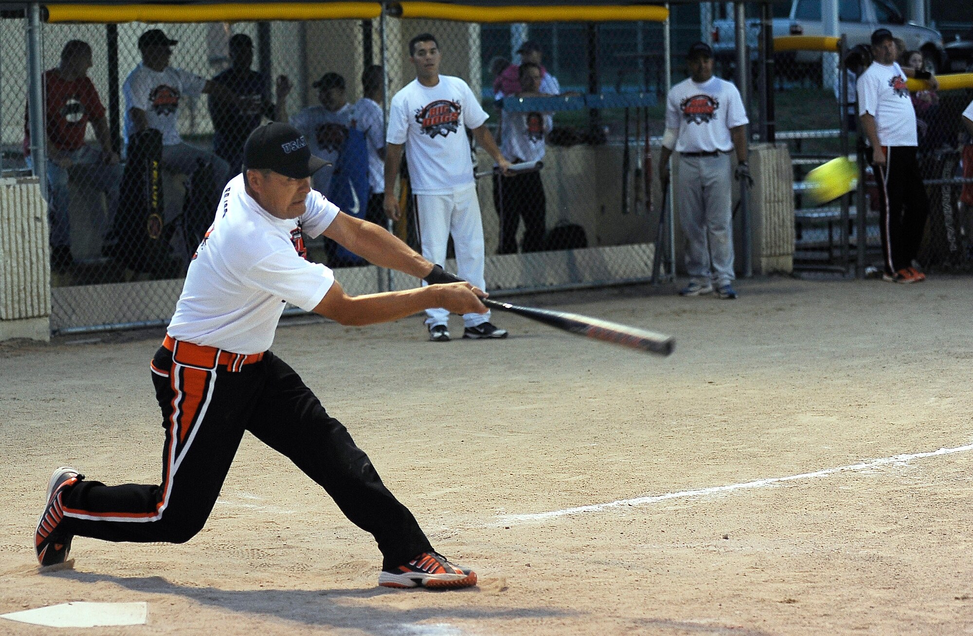 Ken Rojas gets a base hit for the Med Group during the Air Force Academy championship match against the Retirees Aug. 11, 2010. The Med Group took an early lead, but the Retirees surged in later innings to win, 29-19. (U.S. Air Force photo/Rachel Boettcher)