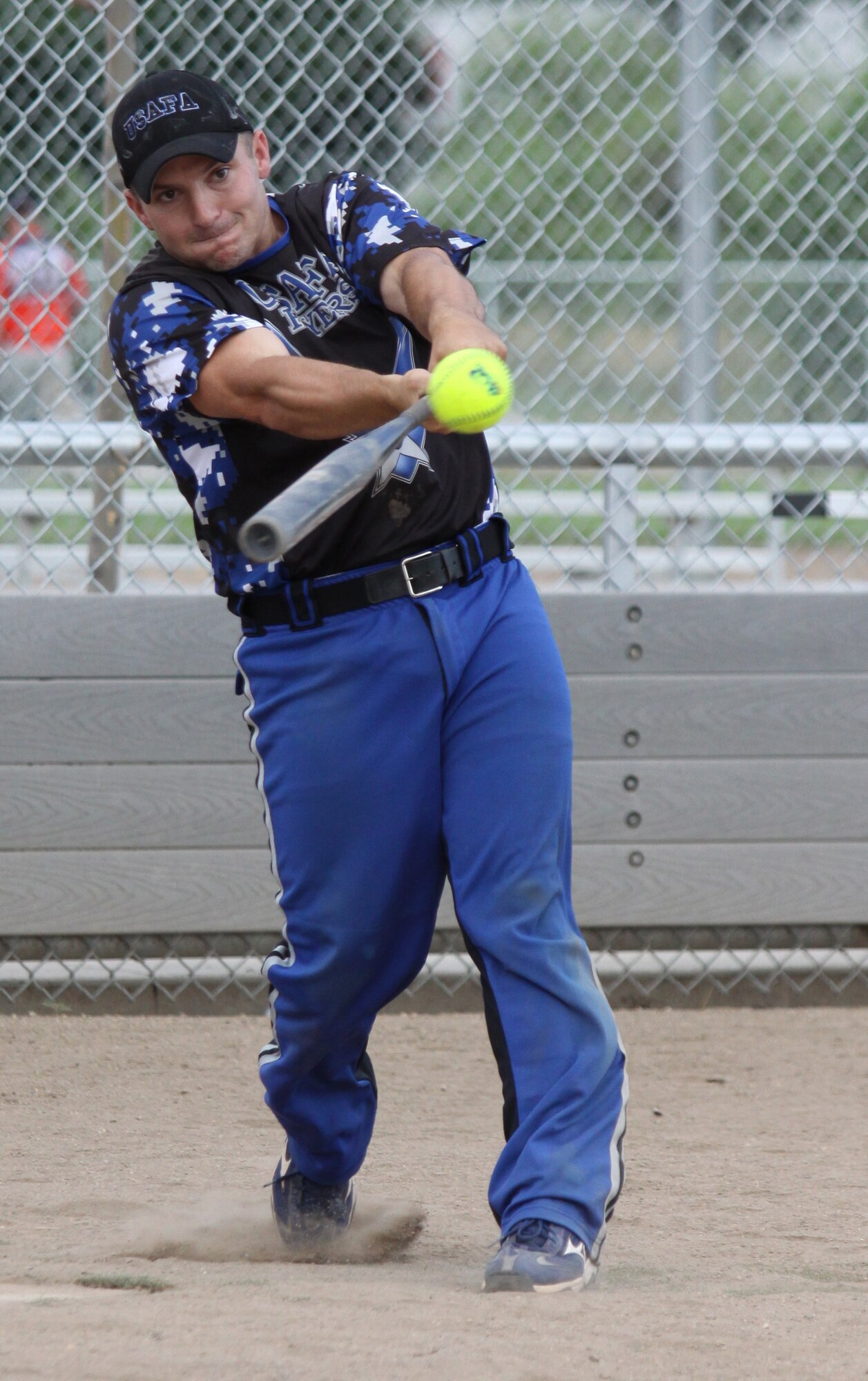 Bryan Kinder hits for the Air Force Academy Flyers during the Colorado varsity softball championships in Loveland, Colo., Aug. 7, 2010. The Flyers defeated the unbeaten Widefield "Feelin' Philly" team in two straight games to win the state varsity softball championship. (U.S. Air Force photo/Wade Dolbow)