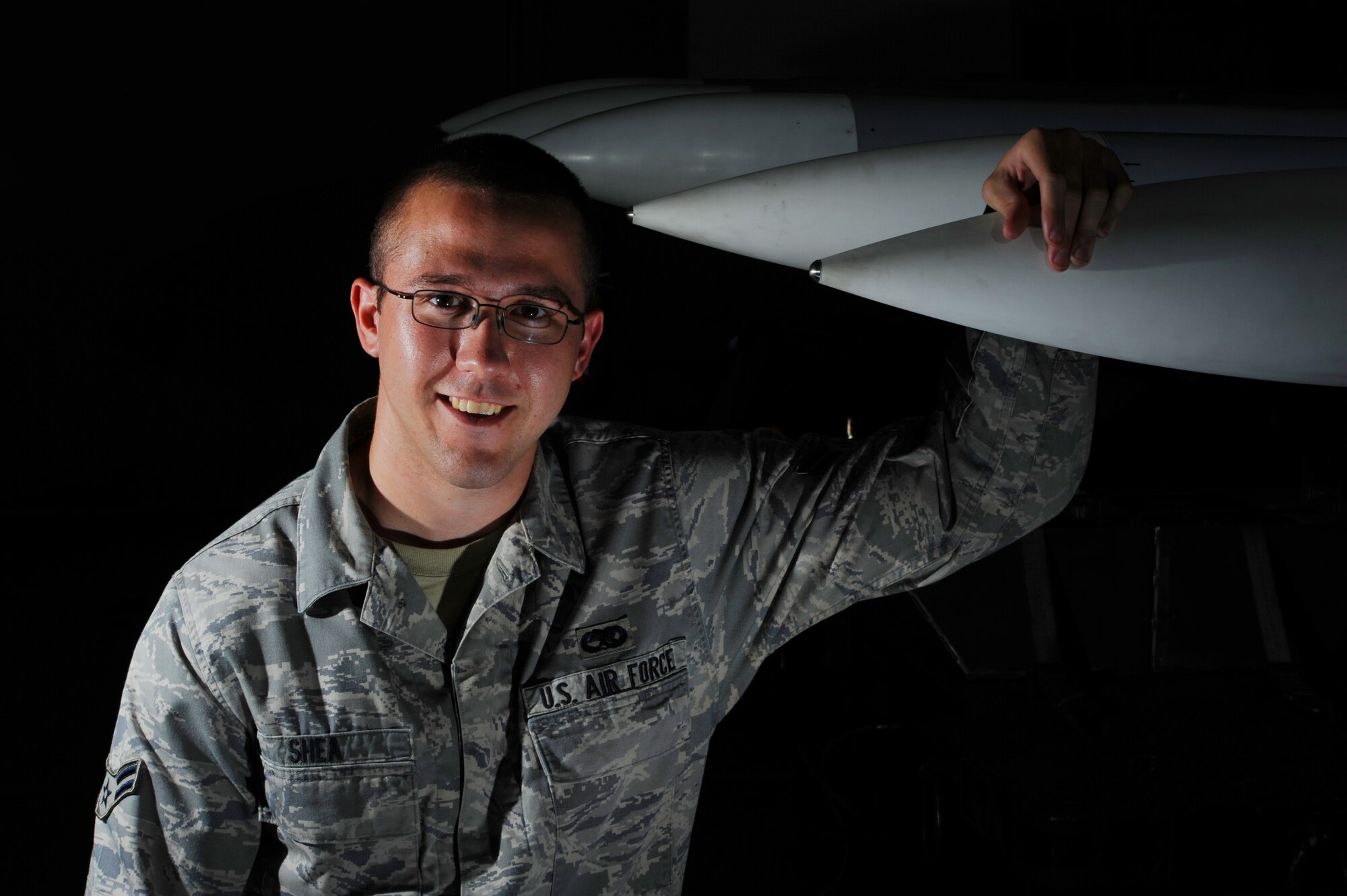 Airman 1st Class Daniel Shea, 15th Maintenance Squadron munitions material section apprentice, is this week’s Hickam Warrior. Airman Shea is responsible for monitoring the condition of a 20 million dollar munitions stockpile. He also is responsible for maintaining two above ground storage magazines. Airman Shea performs periodic inspections on munitions assets. Airman Shea enjoys working out, watching movies, and is and is an avid Frisbee enthusiast. (U.S. Air Force graphic by Staff Sgt. Nathan Allen)
