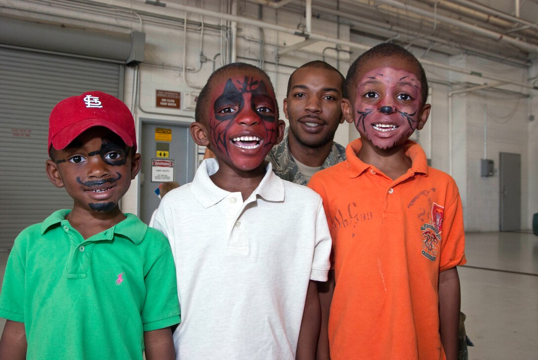 JOINT BASE ANDREWS, Md. -- Family members of 459th Air Refueling Wing Airmen enjoy a fun afternoon of activities, touring a static display of a KC-135R Stratotanker, food and music, here Aug 14. The Family Day Event also recognized the support family members have given to wing servicemembers over the past year. (U.S. Air Force photo/Staff Sgt. Sophia Piellusch)