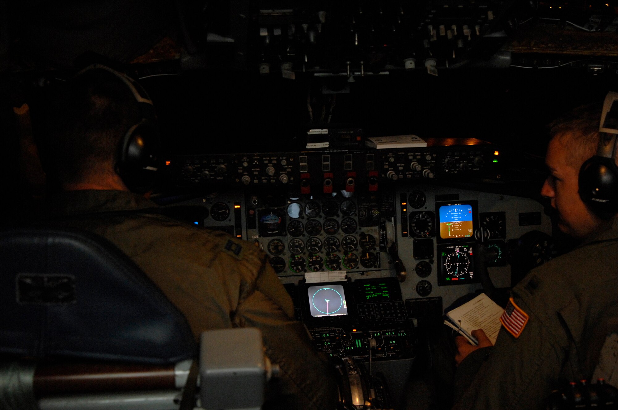 (Left to right) Capt. Jared Alden and 1st Lt. Chris Yeager, 350th Air Refueling Squadron pilots, perform flight inspections Aug. 17, 2010, Grand Forks Air Force Base, N.D. The inspection was conducted as part of McConnell's nuclear operational readiness exercise that involved deploying Airmen and four of the 63 KC-135 Stratotankers to Grand Forks.  (U.S. Air Force photo/Senior Airman Abigail Klein)