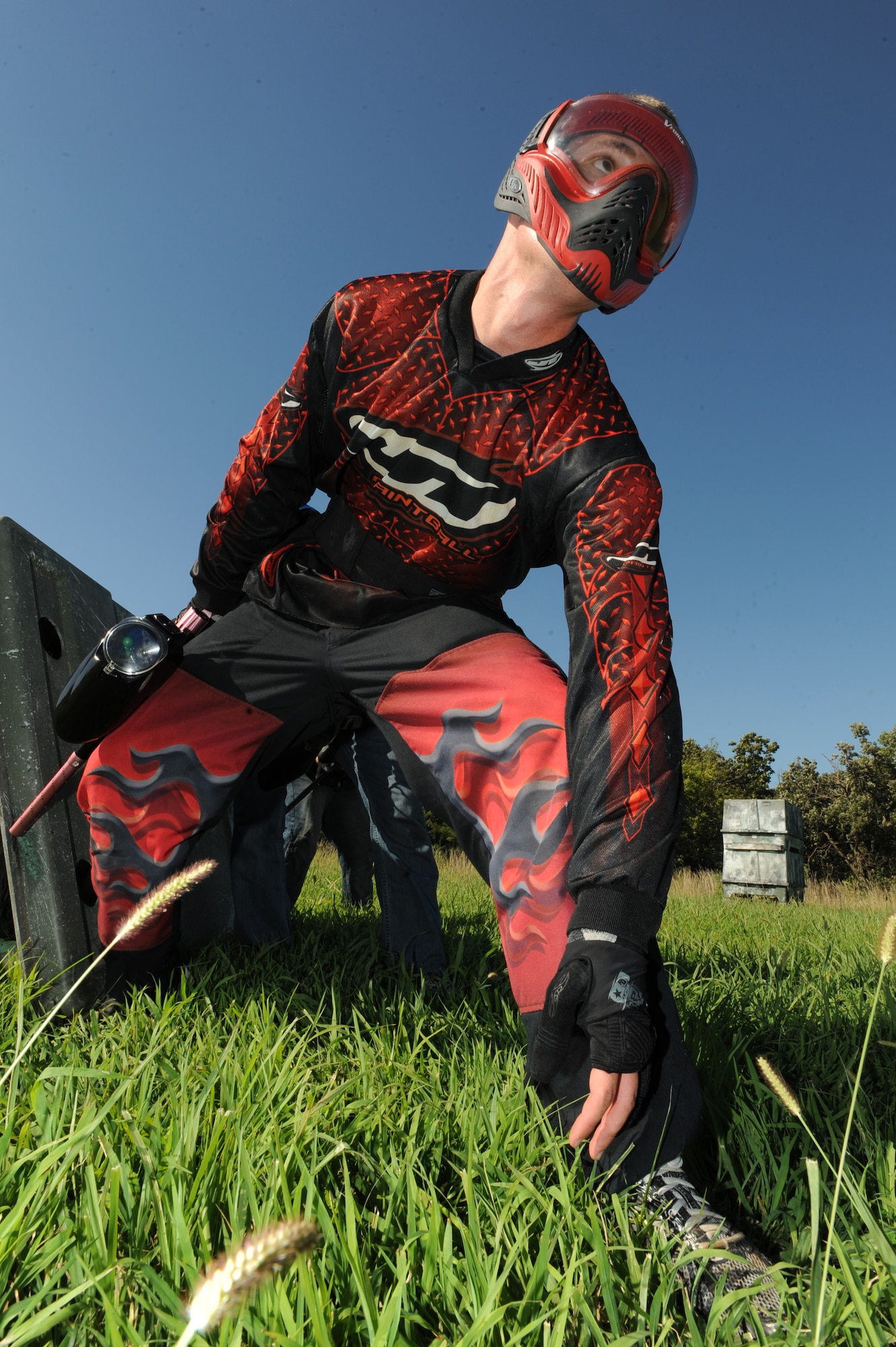 WHITEMAN AIR FORCE BASE, Mo. - Airman 1st Class Ryan Good, 509th Aircraft Maintenance Squadron, stands waiting for a skirmish to start here, Aug 3. The team ensures safety by wearing all the protective gear necessary during a paintball game. (U.S. Air Force photo by Senior Airman Carlin Leslie)
