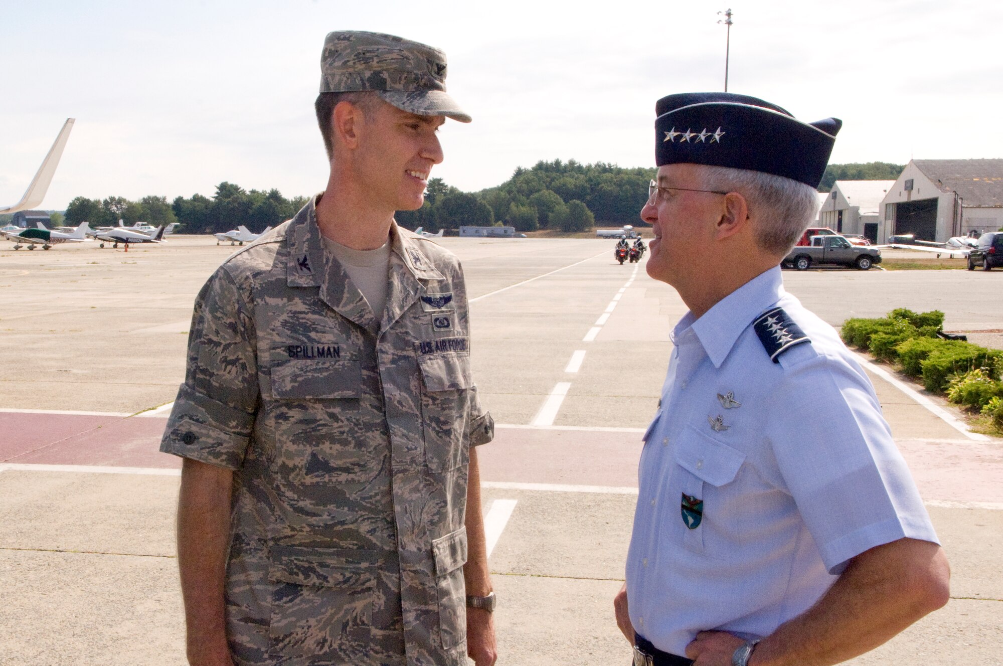 Gen. Douglas M. Fraser, commander of U.S. Southern Command, chats with Electronic Systems Center Vice Commander Col. Mark S. Spillman Aug. 17 on Hanscom's flight line.  General Fraser flew into Hanscom en route to a speaking engagement in Cambridge, Mass.  (U.S. Air Force photo by Mark Wyatt)