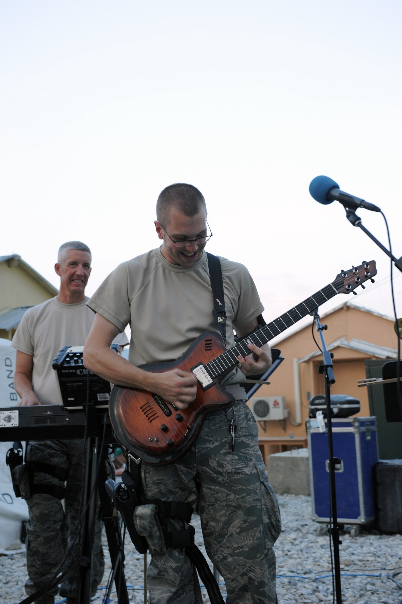 Senior Airman, Kevin Klepacki, guitarist, performs for servicemembers during a performance at Bagram Airfield, Afghanistan Aug., 12, 2010. The AFCENT band for this rotation is ?New Horizons,? the Massachusetts Air Guard Band. (U.S. Air Force Photo/Tech. Sgt. Drew Nystrom)