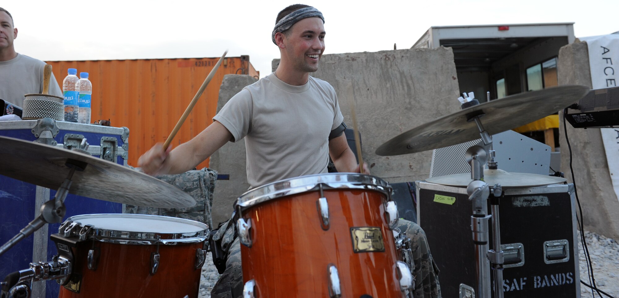 Tech. Sgt. Adam Benham, drummer, performs for servicemembers during a performance at Bagram Airfield, Afghanistan Aug., 12, 2010. The AFCENT band for this rotation is ?New Horizons,? the Massachusetts Air Guard Band. (U.S. Air Force Photo/Tech. Sgt. Drew Nystrom)