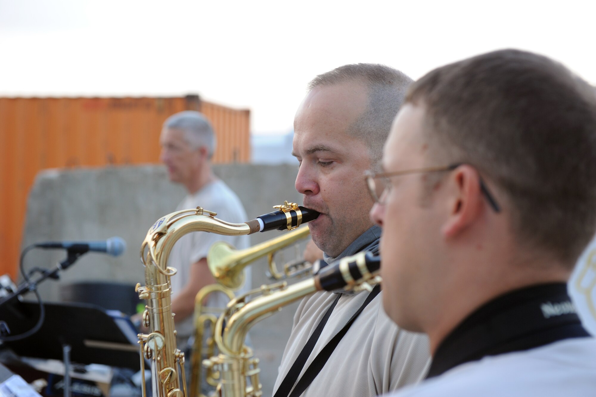 Tech. Sgt. Justin Kilcollum, alto saxophonist and Staff Agt. James Noury, tenor saxophonist perform for servicemembers during a performance at Bagram Airfield, Afghanistan Aug., 12, 2010. The AFCENT band for this rotation is ?New Horizons,? the Massachusetts Air Guard Band. (U.S. Air Force Photo/Tech. Sgt. Drew Nystrom)