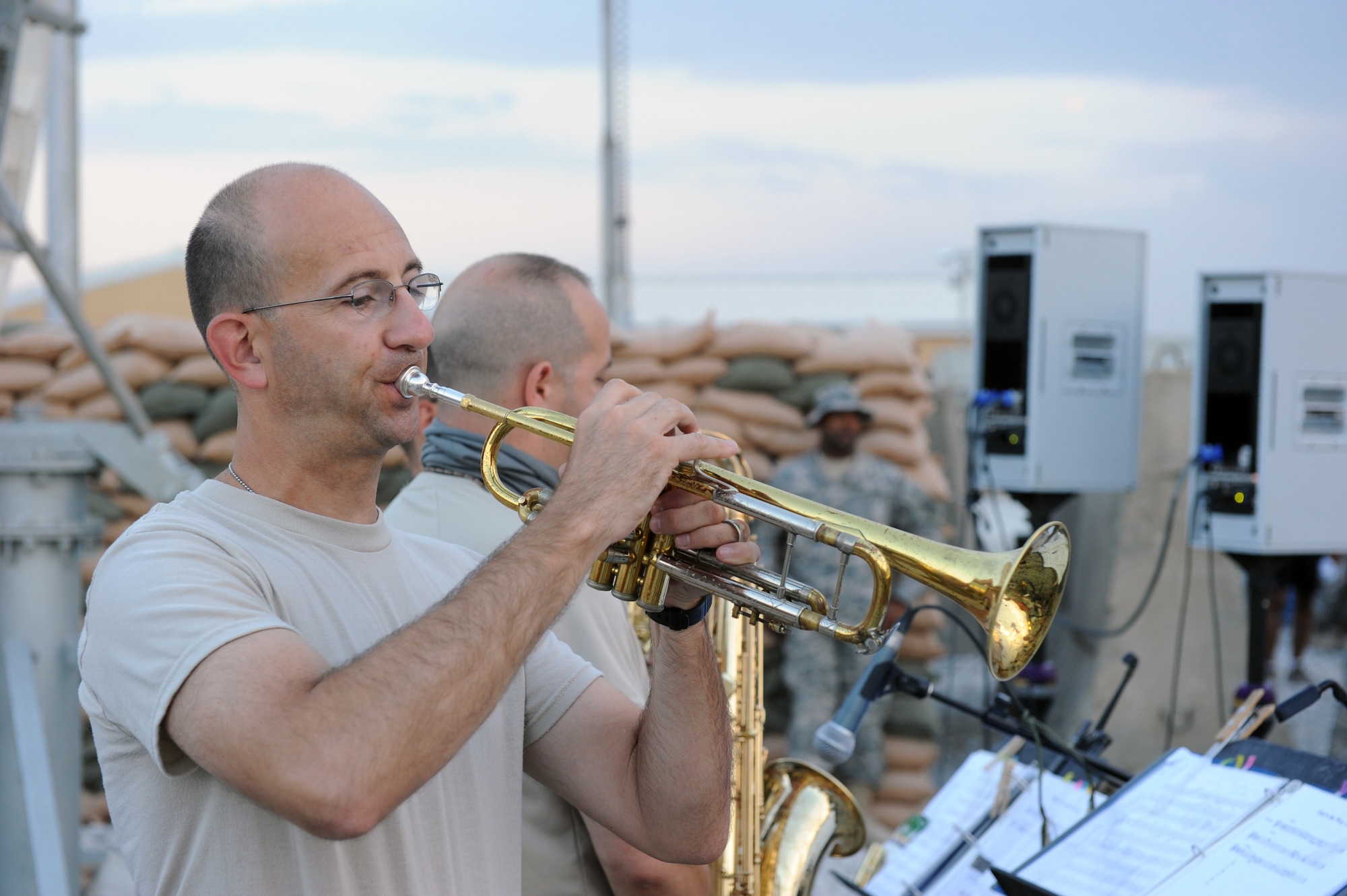 Maj. Bryan Miller, AFCENT band commander and trumpet player, performs for servicemembers during a performance at Bagram Airfield, Afghanistan Aug., 12, 2010. The AFCENT band for this rotation is ?New Horizons,? the Massachusetts Air Guard Band. (U.S. Air Force Photo/Tech. Sgt. Drew Nystrom)