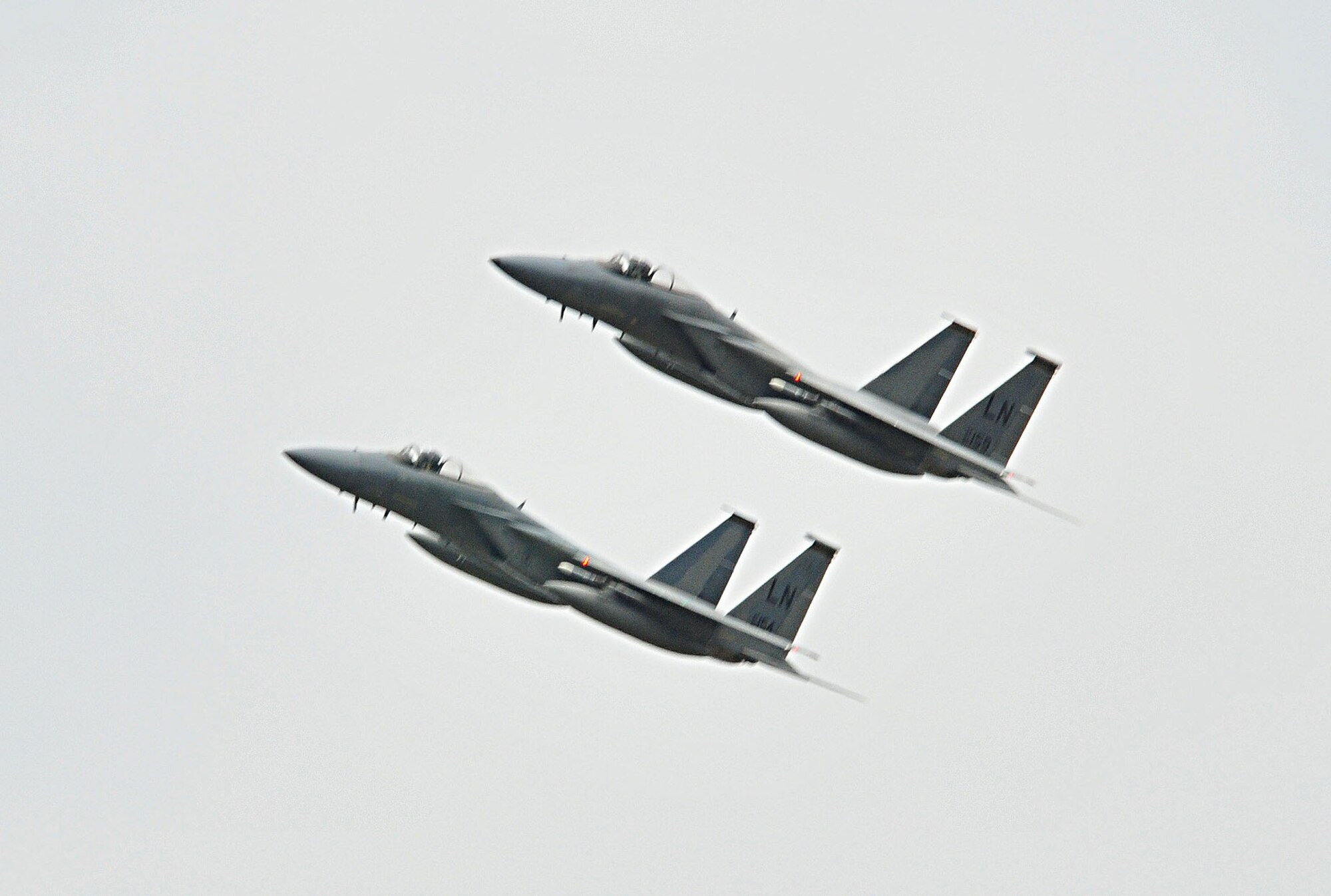 Two F-15s from the 493rd Fighter Squadron perform a flyover during the Heart Air Display and Classic Car Show at Rougham Airfield, Bury St. Edmunds, England, Aug. 15. The flyover represents continued efforts to build partnerships between the city of Bury St. Edmunds and the U.S. Air Force in England and was seen by several thousand people who attended the event.  (U.S. Air Force photo by Staff Sgt. Connor Estes)