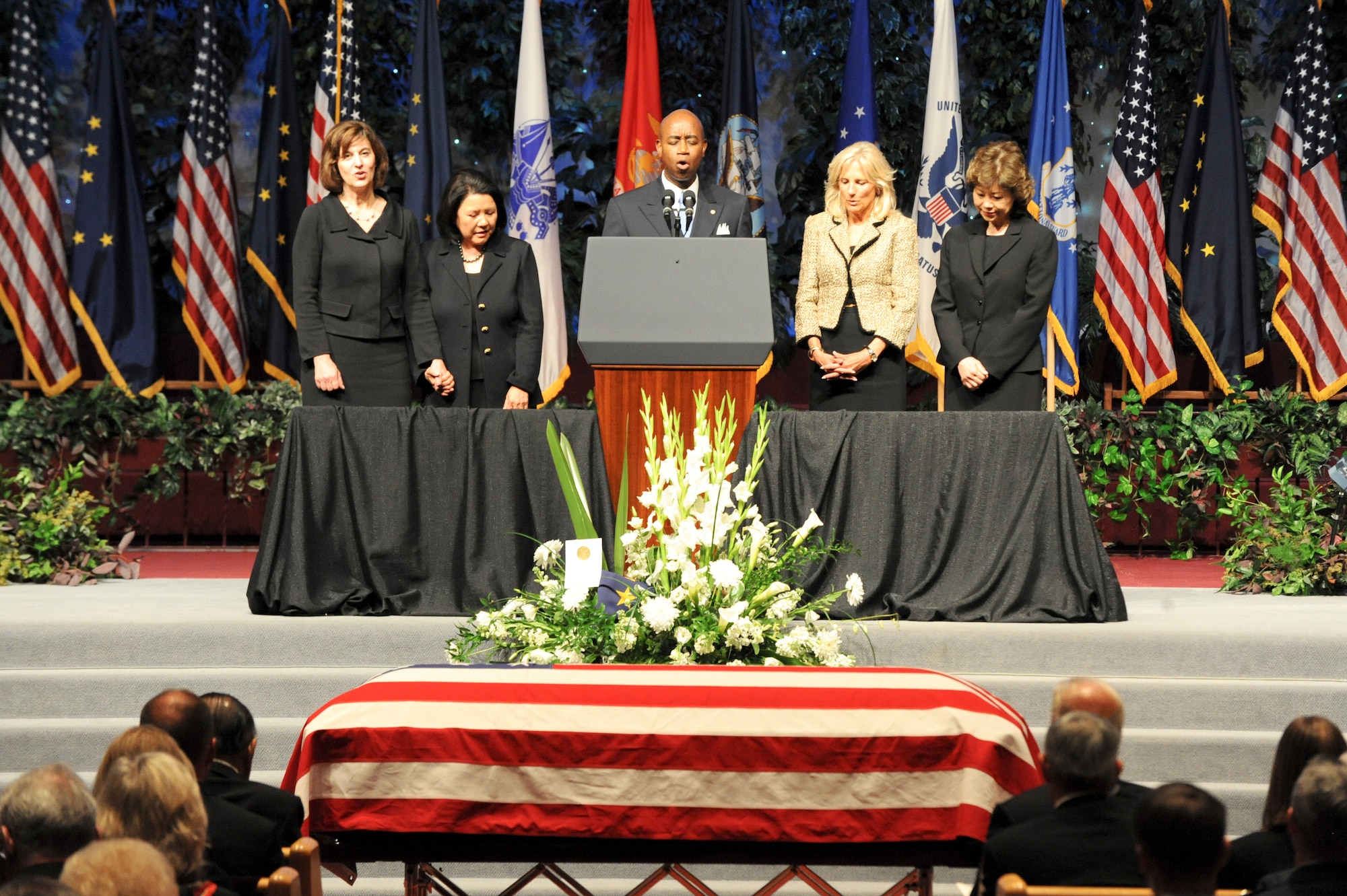 ANCHORAGE, Alaska -- Rear Admiral Barry Black (Ret.), alongside the spouses of guest speakers lead parishioners in "The Lord?s Prayer" during the memorial service for Former Sen. Ted Stevens. People from the Anchorage and military community along with many political dignitaries attended the late senator's service. (U.S. Air Force Photo by Staff Sgt. Joshua Garcia) 