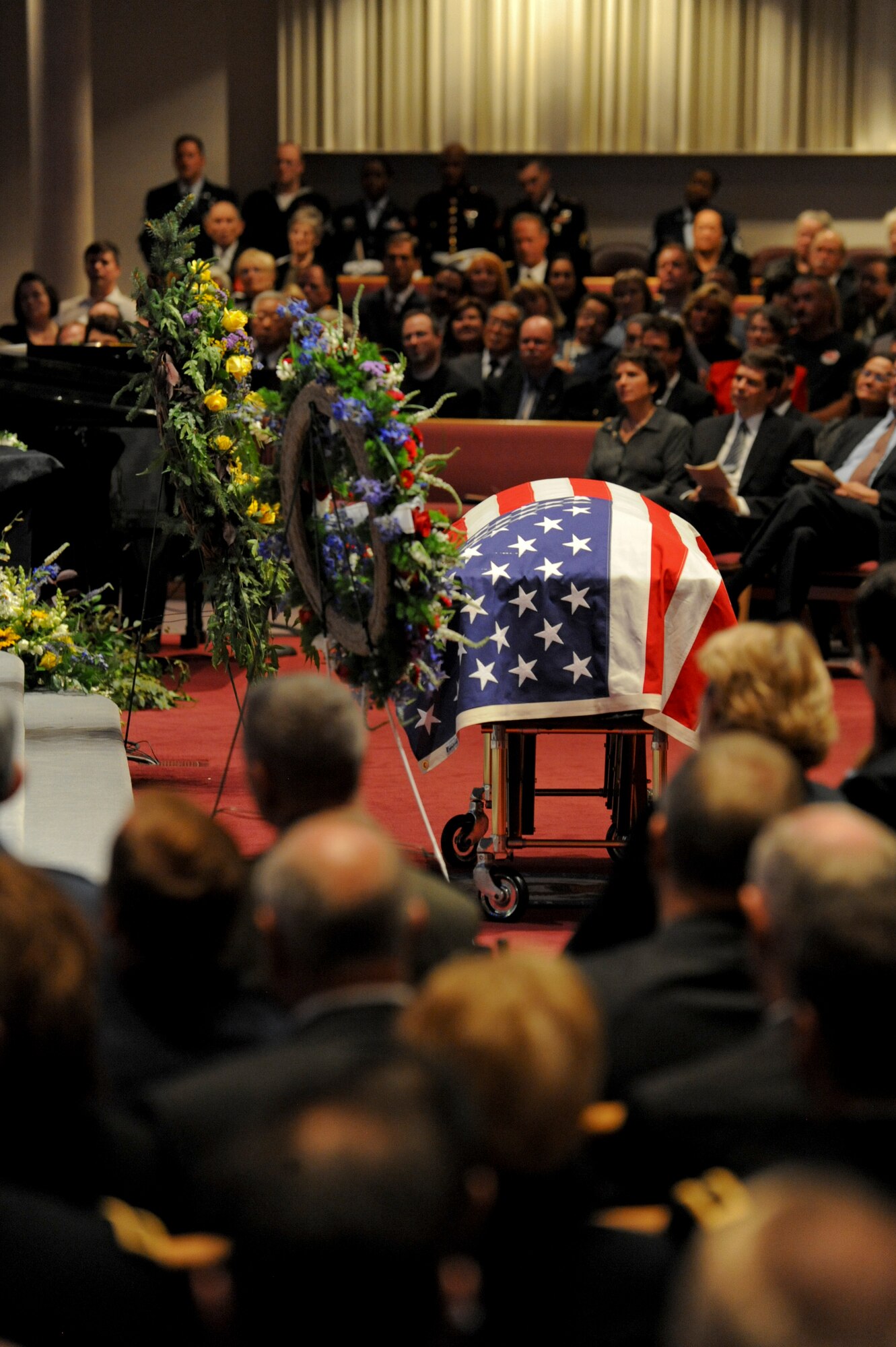 ANCHORAGE, Alaska -- The flag-draped coffin of former Sen. Ted Stevens is positioned in front of mourners during a memorial service at Anchorage Baptist Temple here, Aug. 18th.  Sen. Stevens' body was under a twenty four hour watch by a military detail leading up to the memorial. (U.S. Air Force Photo by Staff Sgt. Joshua Garcia) 
