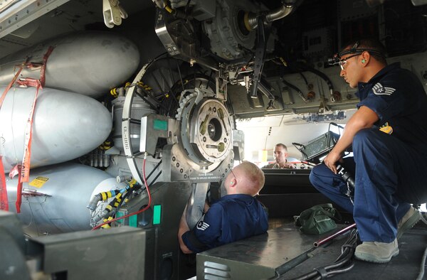 Staff Sgt. Daniel Santell and Staff Sgt. Jose Baez-Sauri, members of the 2d Aircraft Maintenance Squadron weapons load crew, direct a trainer cruise missile into place for load on a B-52H Stratofortress during the weapons load portion of the Global Strike Challenge Aug. 17. More than 400 Airmen from 2d Bomb Wing and B-52 Stratofortress were able to compete in this year?s challenge. (U.S. Air Force photo/Senior Airman Amber Ashcraft) (RELEASED)