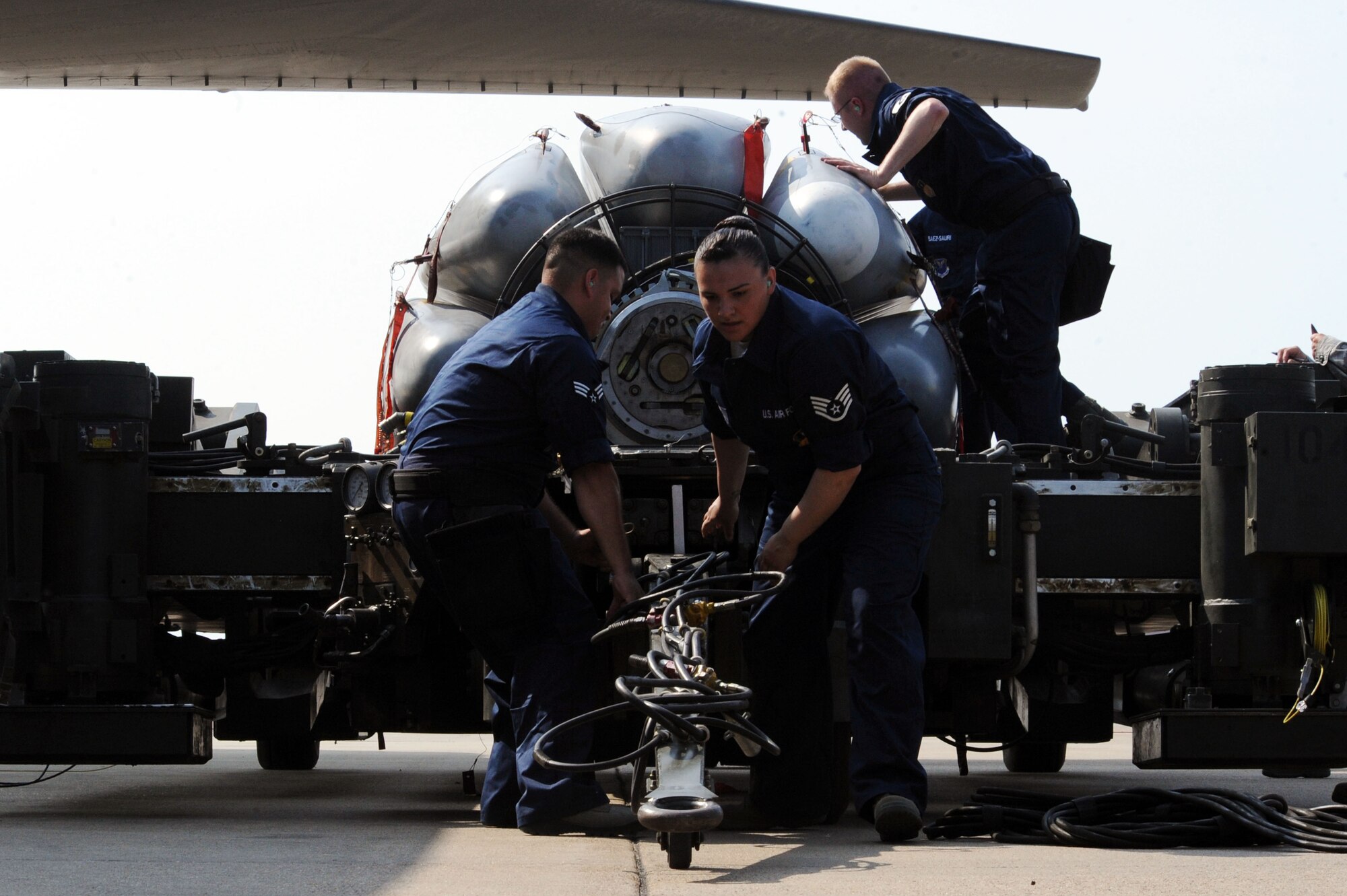 BARKSDALE AIR FORCE BASE, La. ? Weapons load crew members from the 2d Aircraft Maintenance Squadron inspect trainer cruise missiles before loading them onto a B-52H Stratofortress during the Global Strike Challenge Aug 17. The competition itself consisted of a test in knowledge of Air Force Instruction and technical data, dress and appearance, pre-flight inspection, trainer weapons loads and a buildup of munitions. (U.S. Air Force photo by Senior Airman Brittany Y. Bateman)(RELEASED)