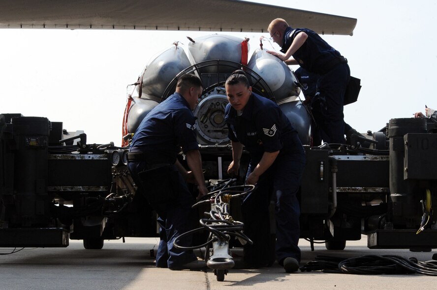 BARKSDALE AIR FORCE BASE, La. -- Weapons load crew members from the 2d Aircraft Maintenance Squadron inspect trainer cruise missiles before loading them onto a B-52H Stratofortress during the Global Strike Challenge Aug 17. The competition itself consisted of a test in knowledge of Air Force Instruction and technical data, dress and appearance, pre-flight inspection, trainer weapons loads and a buildup of munitions. (U.S. Air Force photo by Senior Airman Brittany Y. Bateman)(RELEASED) 
