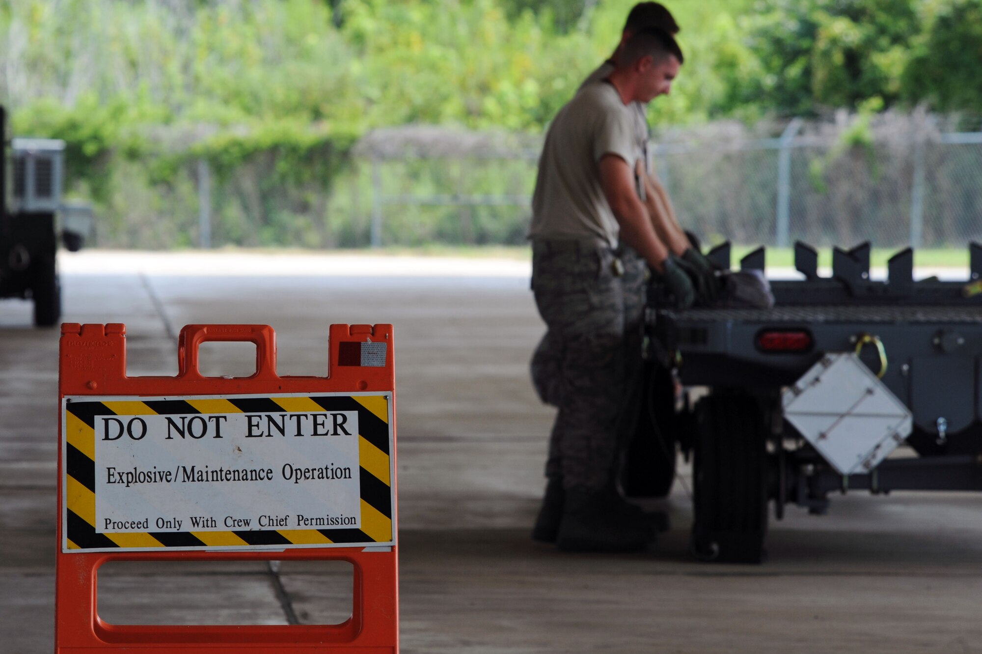 BARKSDALE AIR FORCE BASE, La. ? Airmen from the 2d Munitions Squadron participate in the Global Strike Challenge Aug. 17. The competition itself consisted of a test in knowledge of Air Force Instructions and technical data, dress and appearance, pre-flight inspection, trainer weapons loads and a buildup of munitions. (U.S. Air Force photo by Senior Airman Brittany Y. Bateman)(RELEASED)