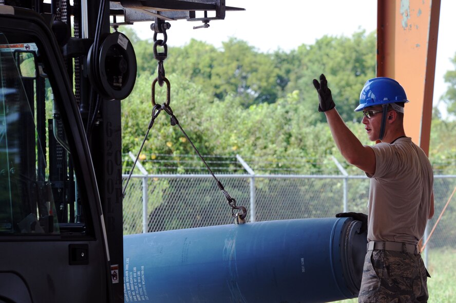 BARKSDALE AIR FORCE BASE, La. --  An Airman from the 2d Munitions Squadron guides a forklift carrying a trainer missile during the Global Strike Challenge Aug. 17. As many as 400 Airmen are competing, including Airmen from Air Force Global Strike Command, Air Combat Command and the Air Reserve Component. (U.S. Air Force photo by Senior Airman Brittany Y. Bateman)(RELEASED) 
