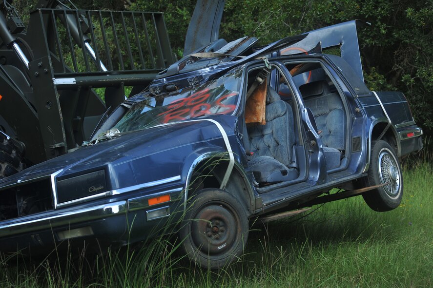 MOODY AIR FORCE BASE, Ga. -- A vehicle from a local junkyard is used by Airmen from the 23rd Civil Engineer Squadron Explosive Ordnance Disposal flight for training here Aug. 16. The EOD team conducted training at an on-base site to observe the cause and effect of certain explosives. (U.S. Air Force photo/Airman 1st Class Joshua Green)
