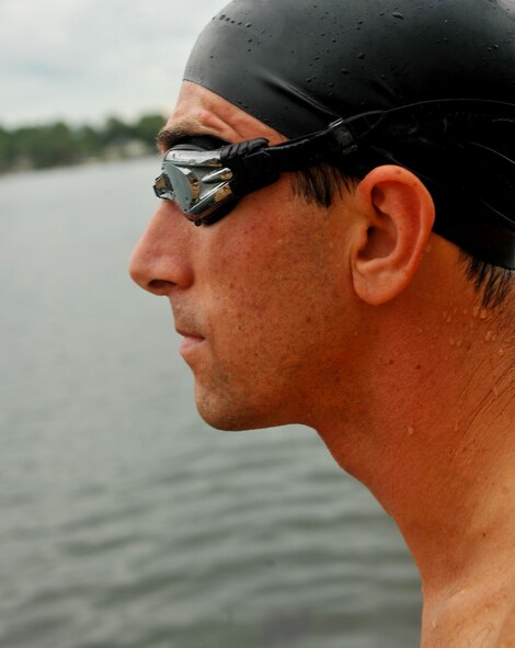 Lake Park, Ga. -- Capt. Trevor Ambron, 822nd Security Forces Squadron physician assistant from Moody Air Force Base, Ga., looks out to the lake before diving in here Aug. 18. Captain Ambron is a part of a triathlon team that participates in events and competitions around Georgia and Florida. (U.S. Air Force photo/Airman 1st Class Joshua Green)