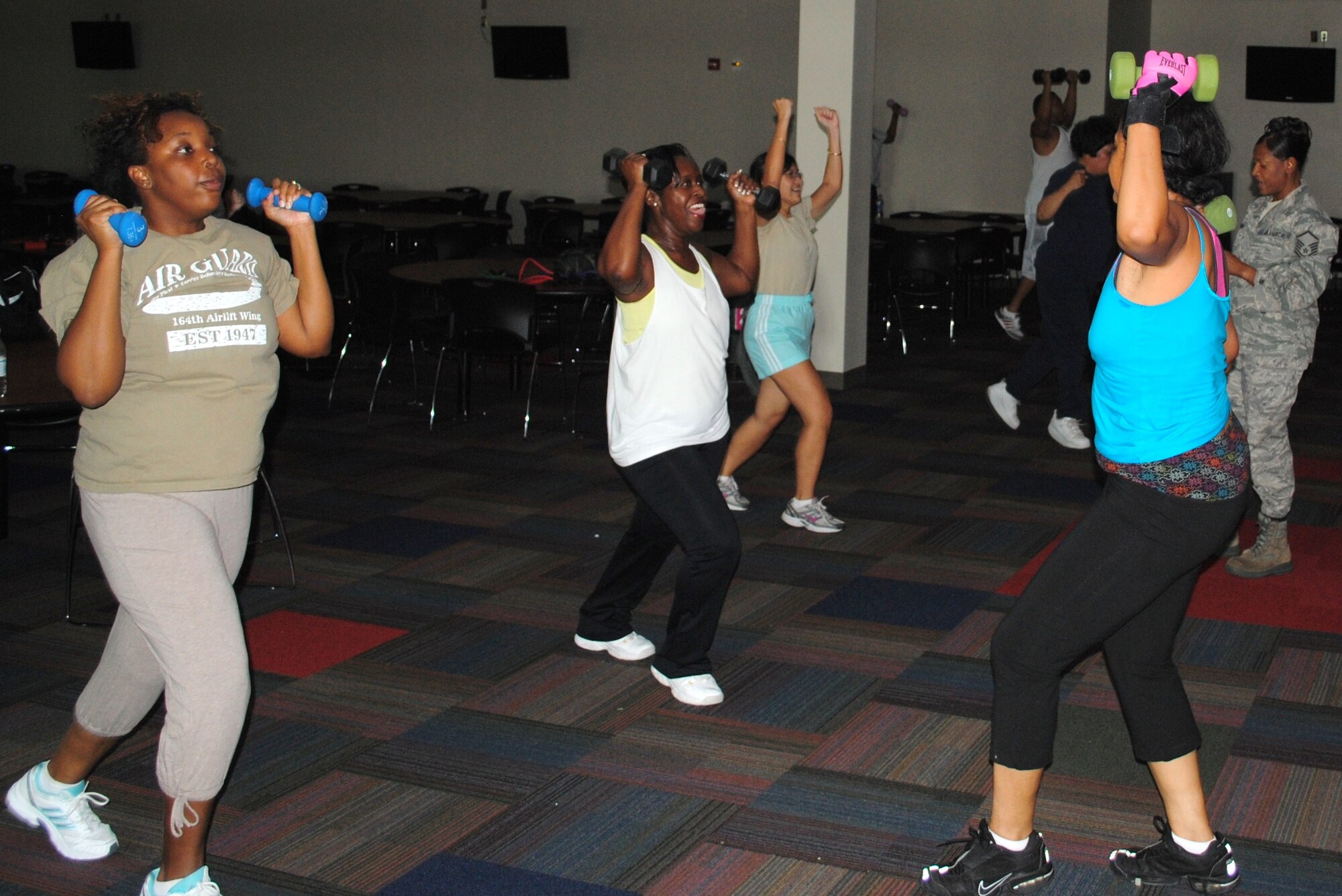 Members of the 164th Airlift Wing participate in various exercises during "boot camp" workout program.