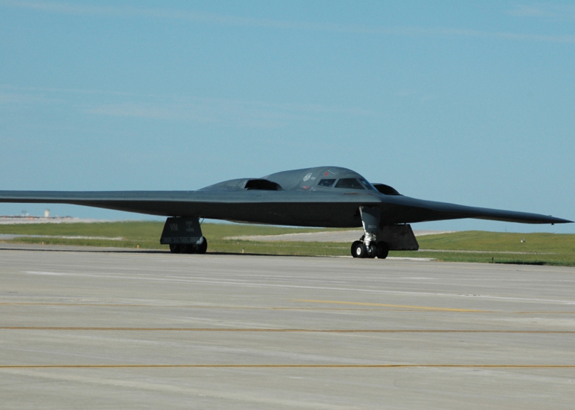 Lt. Col. Michael Pyburn, 131st Bomb Wing, Missouri Air National Guard, taxis a B-2 Spirit back to the hangar after achieving 1,000 flying hours, August 15, at Whiteman AFB, Mo. Pyburn joins an elite group of 131st Bomb Wing Missouri Air National Guard pilots: Lt. Col. Michael Means who achieved this milestone almost three years ago while on active duty; Lt. Col. Rhett Binger, June 2009; and Maj. Jared Kennish, Oct.2009; Maj. John Avery, March 2010.  (Air Force Photo by Technical Sgt. Chris Boehlein. RELEASED)