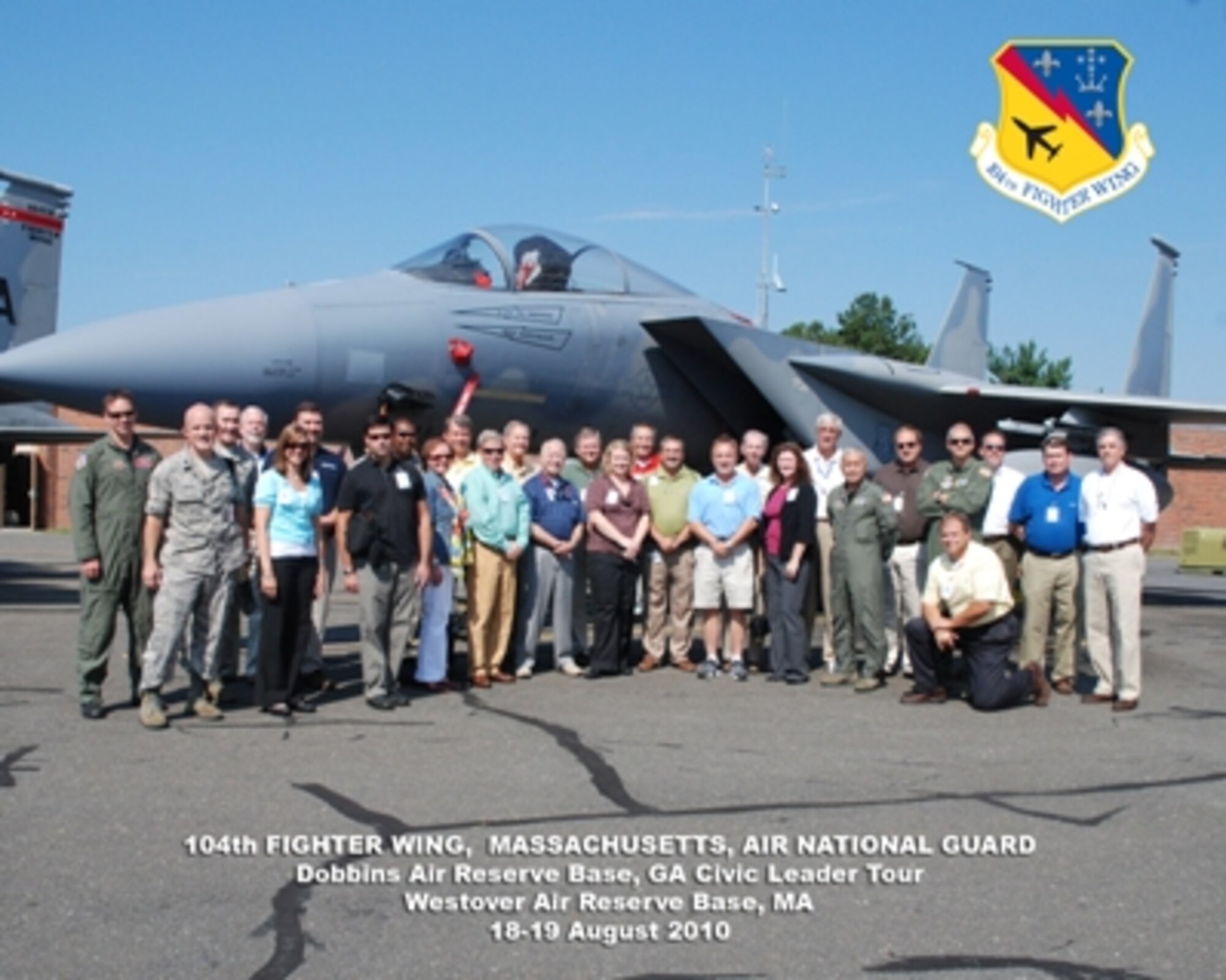 Civic leaders from the Atlanta-area pose with an F-15 Eagle at the 104th Fighter Wing, Massachusetts Air National Guard in Westfield, Mass., Aug. 19, prior to their return flight on a C-130 aircraft to Dobbins Air Reserve Base, Ga.  (U.S. Air Force photo/Master Sgt. James Branch)