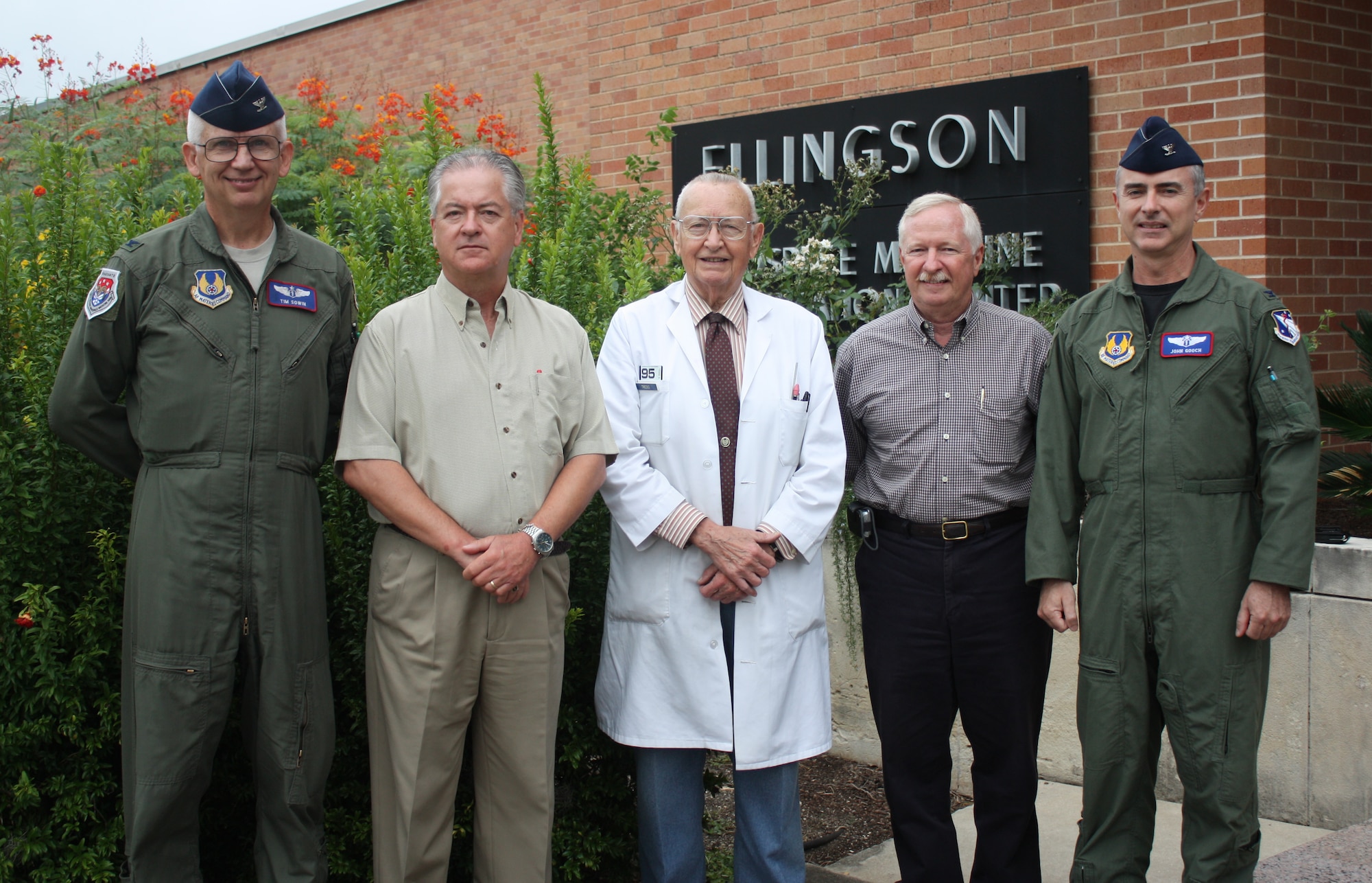 Col. (Dr.) Timothy Sowin, Dr. Doug Ivan, Dr. Thomas Tredici, Dr. John Patterson, and Col (Dr.) John Gooch in front of the Aerospace Medicine Consulation division at Brooks City-Base, TX.  Photo By: Amy Velasquez