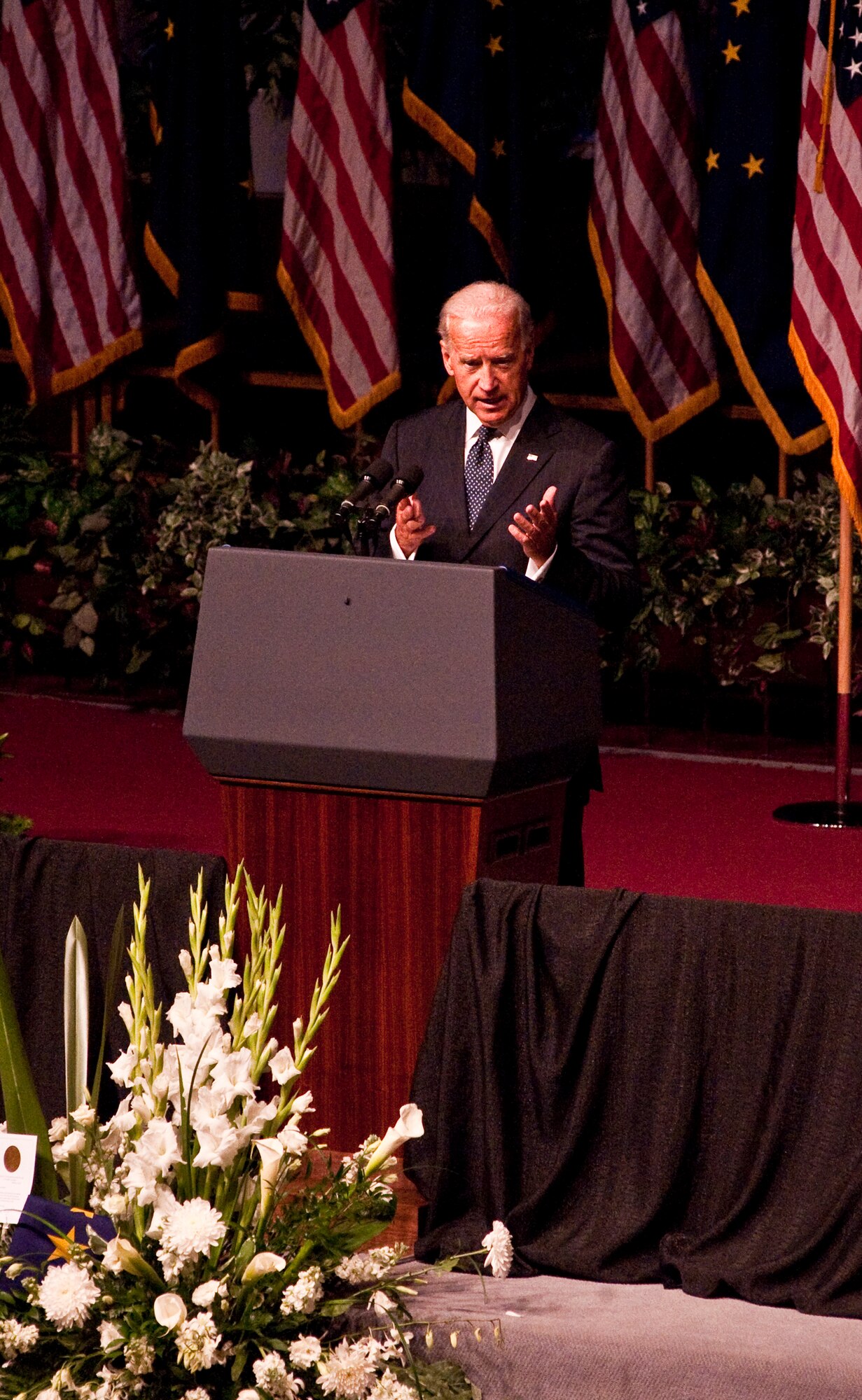 ANCHORAGE, Alaska -- Those in attendance for former Senator Ted Stevens funeral service listen to U.S. Vice President Joe Biden has he reminisces about his past with the late senator Aug. 18. People from the Anchorage and military community along with many political dignitaries attended the late senator's service. (Photo by Airman 1st Class Christopher Gross/JBER PAO)