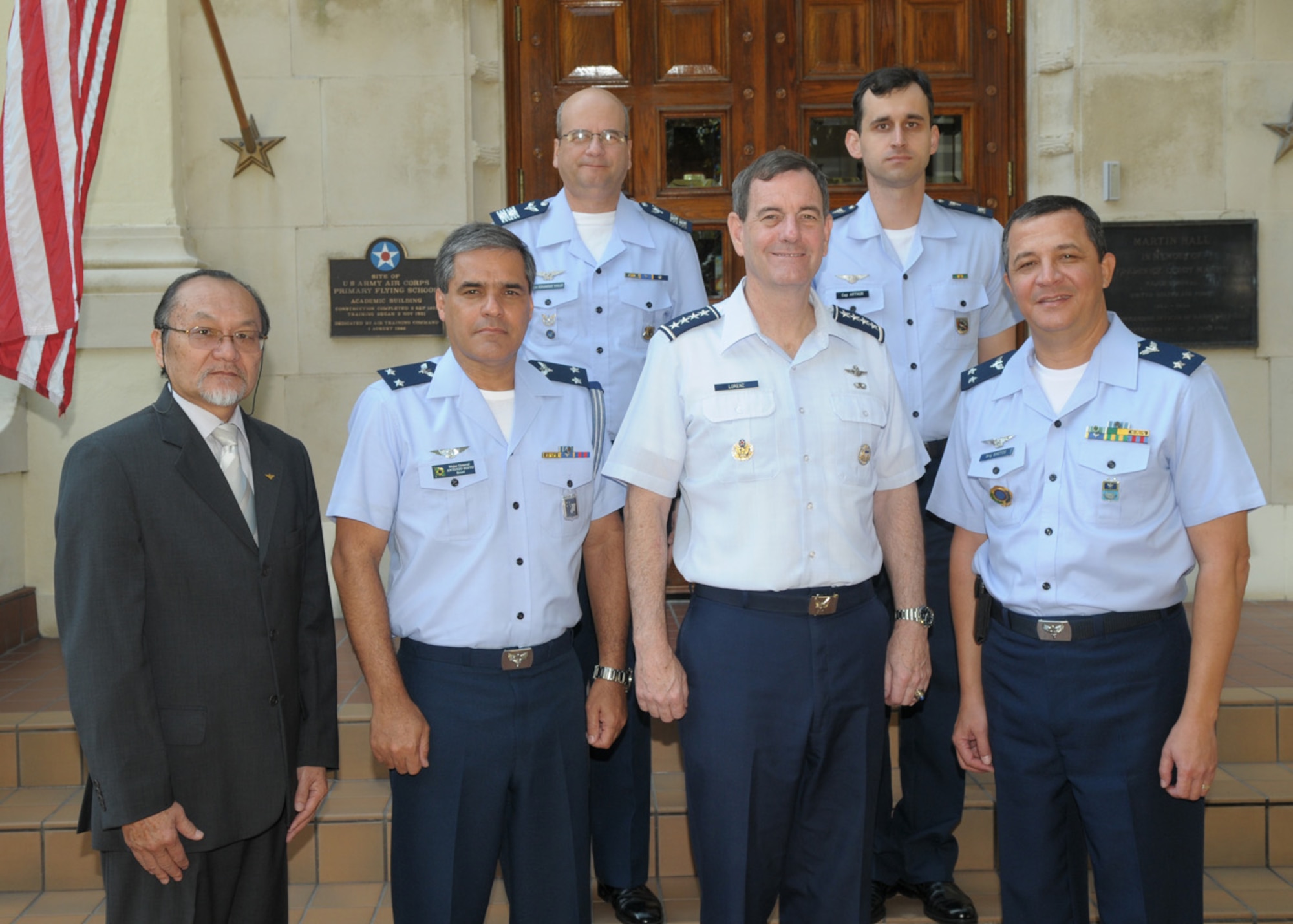 Members of the Brazilian air force visit Randolph AFB, Texas, Aug. 18, to learn about Air Education and Training Command learning opportunities and institutions. The U.S. is one of eight countries they will visit to foster and maintain international partnerships while gaining insight into training and education programs used by other military organizations around the world. Front row, left to right, Dr. Fernando Sakane, BAF Technological Institute vice rector; Maj. Gen. Egito do Amaral, Brazilian Defense and Air attaché; Gen. Stephen Lorenz, AETC commander; Maj. Gen. Bastos, BAF Manpower and Personnel chief. Back row, left to right, Col. Valle Rosa, BAF Command and Staff College division chief; Capt. Gentil Tonelli, BAF Group of Technical and Specialized Instruction division chief. (U.S. Air Force photo/Joel Martinez)