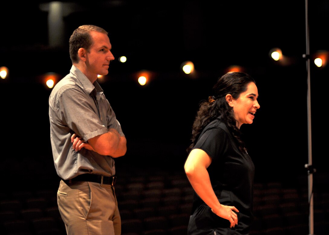 Captain Cristina Moore Urrutia and 2nd Lieutenant Joseph Hansen prepare for the first day of the concert band recording session on August 7, 2010.