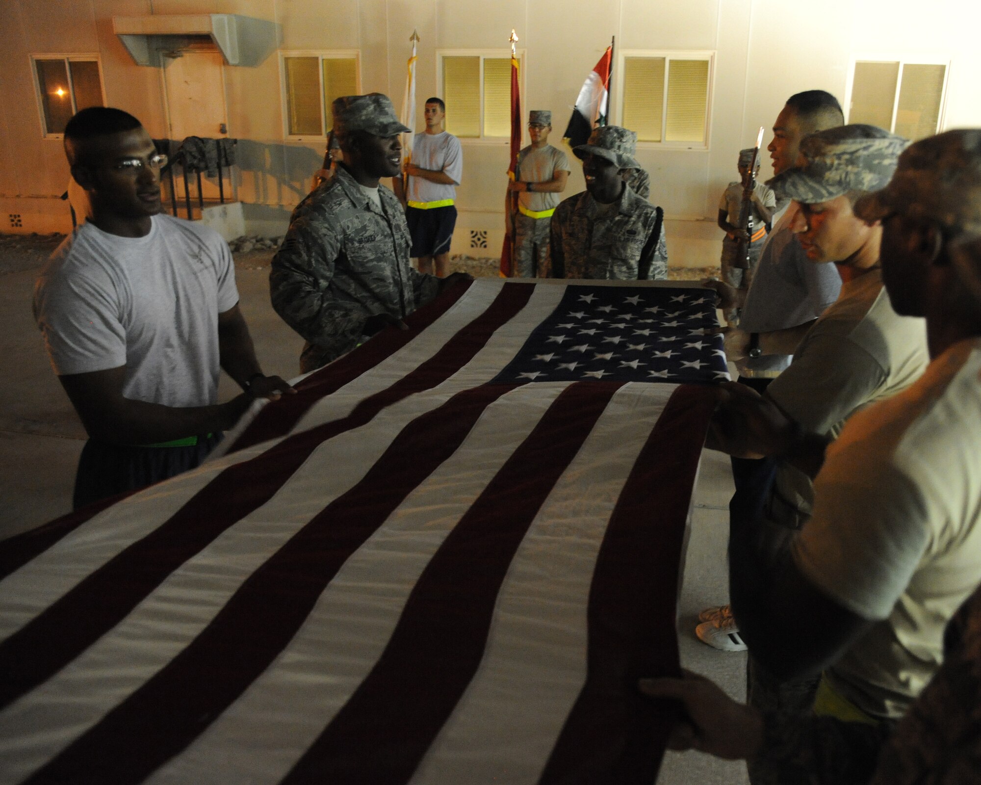 Members of the honor guard practice for upcoming events at an undisclosed location in Southwest Asia August 3. (U.S. Air Force photo/Senior Airman Katie Gieratz)