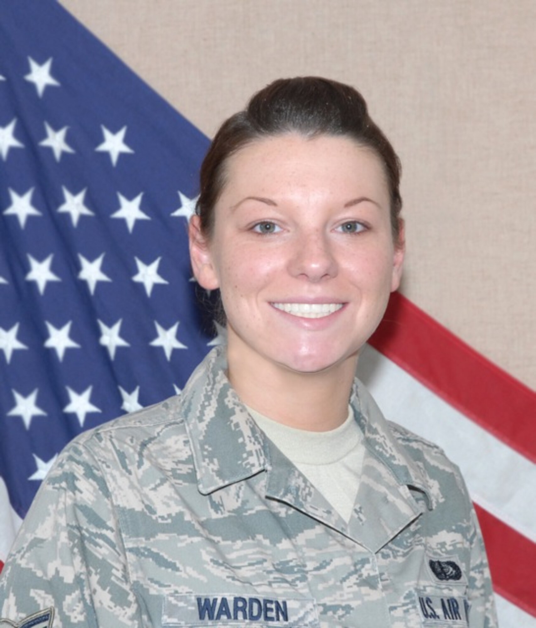 KUNSAN AIR BASE, Republic of Korea -- Airman First Class Clare Warden, 8th Force Support Squadron cook, was recently selected to pin on the rank of senior airman below the zone. Airman Warden will pin on the rank Aug. 27, six months ahead of her peers. (U.S. Air Force photo/Courtesy photo)