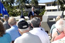 Retired General Bruce Carlson, Director, National Reconnaissance Office speaks to attendees of the plaque dedication ceremony commemorating the 50th anniversary of the "Catch a Falling Star" mission Aug. 19 at Joint Base Pearl Harbor Hickam, Hawaii.  The 6549th Test Group and 6593rd Test Squadron were responsible for the recovery of re-entry capsules in support of the National Reconnaissance Office's Corona program. (U.S. Air Force photo by David D. Underwood, Jr.)