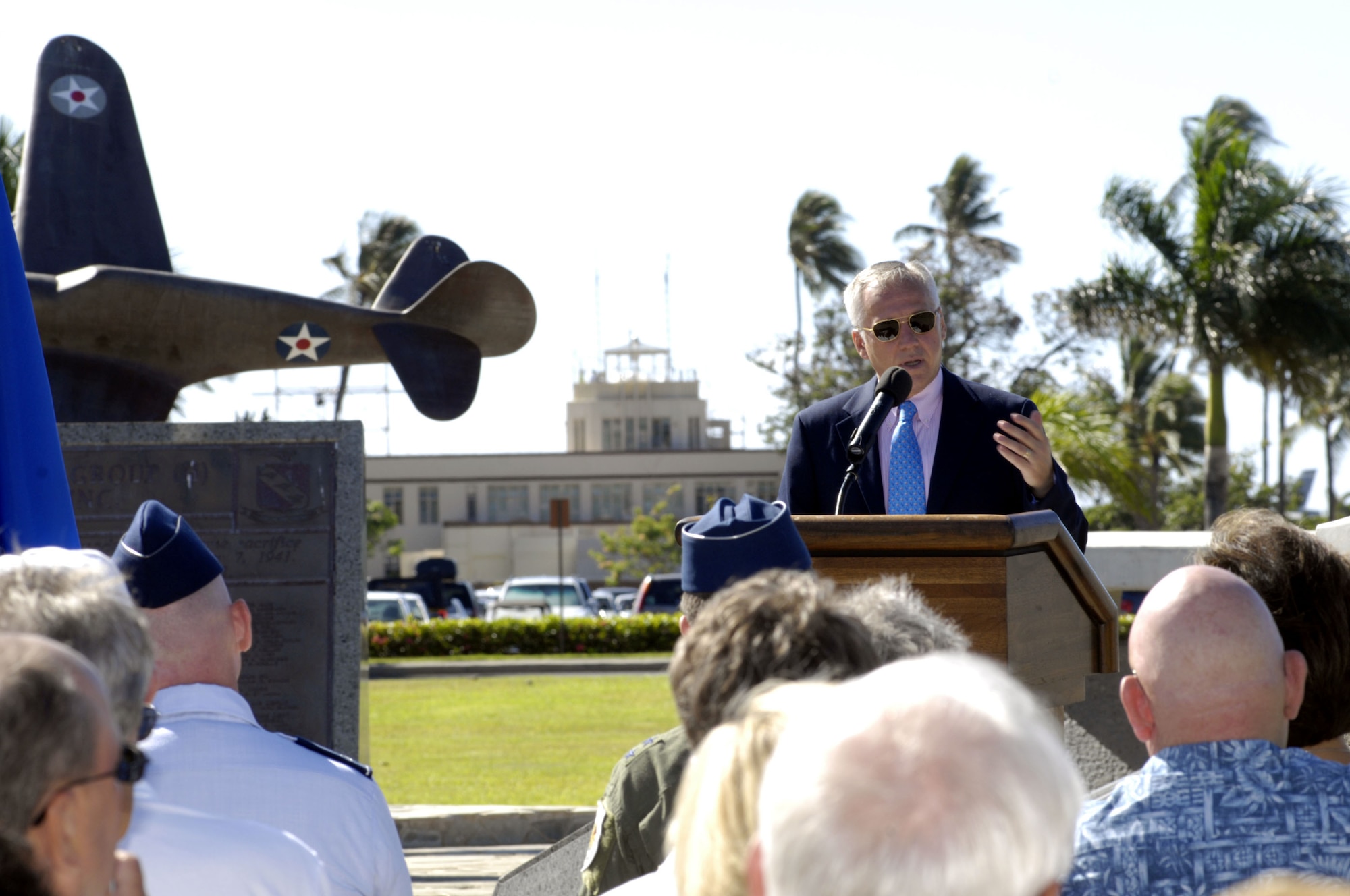 Retired General Bruce Carlson, Director, National Reconnaissance Office speaks to attendees of the plaque dedication ceremony commemorating the 50th anniversary of the "Catch a Falling Star" mission Aug. 19 at Joint Base Pearl Harbor Hickam, Hawaii.  The 6549th Test Group and 6593rd Test Squadron were responsible for the recovery of re-entry capsules in support of the National Reconnaissance Office's Corona program. (U.S. Air Force photo by David D. Underwood, Jr.)
