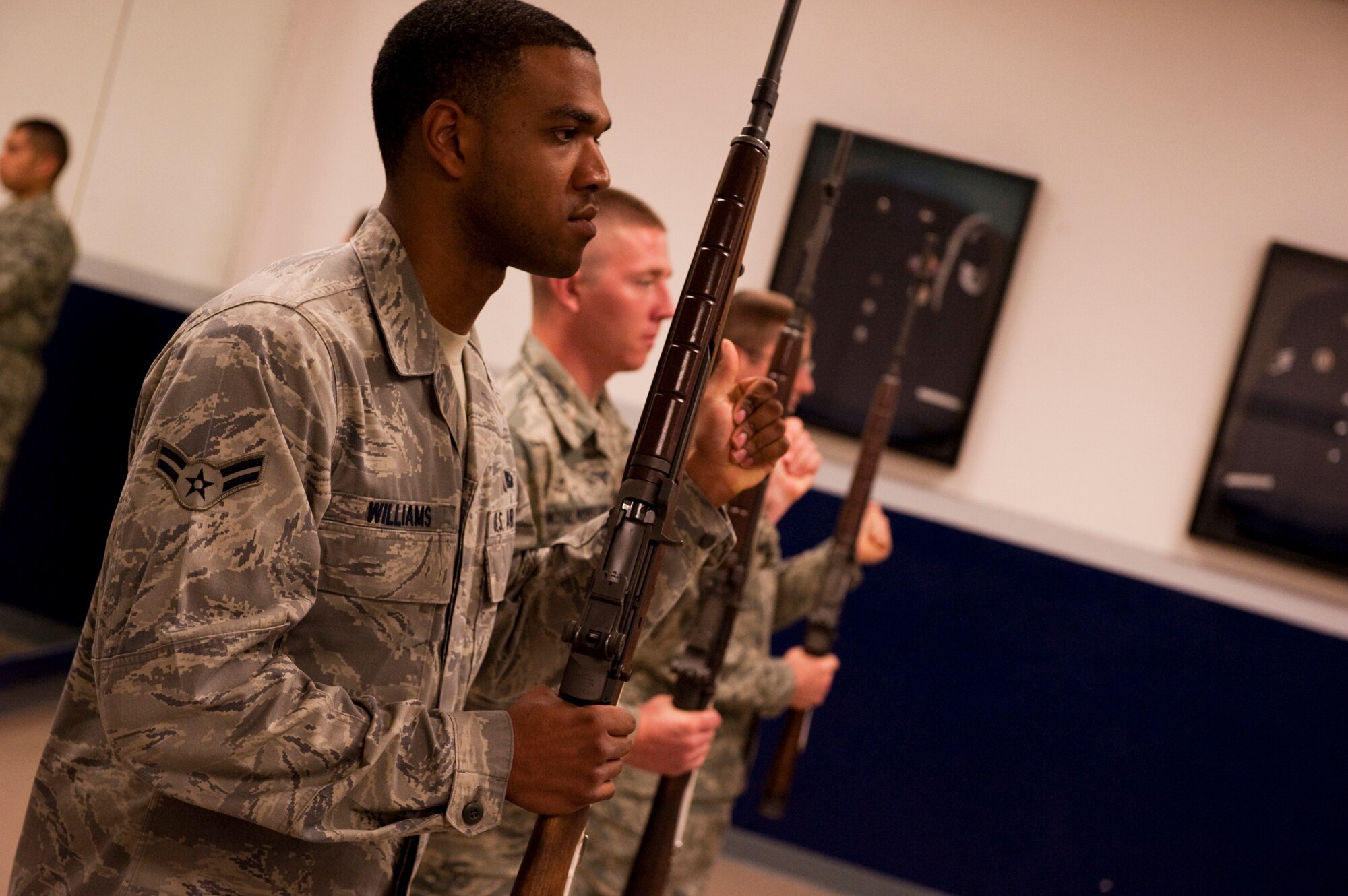JOINT BASE ELMENDORF-RICHARDSON, Alaska -- Airman 1st Class Royce Williams practices with other members of honor guard Aug. 19 at Joint Base Elmendorf-Richardson. Airman Williams had the privilege of escorting the body of the late Alaska Sen. Ted Stevens during his viewing and memorial service Aug. 17 and 18. Airman Williams said it was an honor to have taken part in such a historic event in our nation's history. (Photo by Airman 1st Class Christopher Gross/JBER PAO)