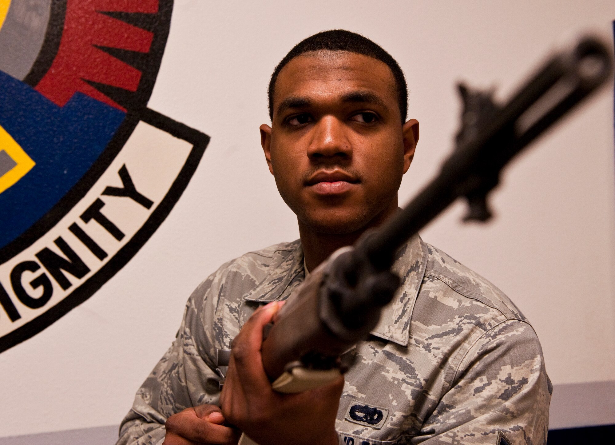 JOINT BASE ELMENDORF-RICHARDSON, Alaska -- Airman 1st Class Royce Williams practices gun handling drills during an honor guard practice Aug. 19 at Joint Base Elmendorf-Richardson. Airman Williams had the privilege of escorting the body of the late Alaska Sen. Ted Stevens during his viewing and memorial service Aug. 17 and 18. Airman Williams said it was an honor to have taken part in such a historic event in our nation's history. (Photo by Airman 1st Class Christopher Gross/JBER PAO)