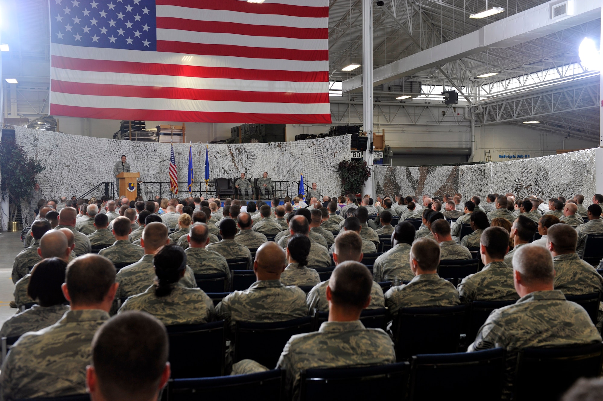 JOINT BASE MCGUIRE-DIX-LAKEHURST, N.J. - Brig. Gen. Michael Kim, 21st Expeditionary Mobility Task Force Commander addresses members of the 621st Contingency Response Wing during a change of command ceremony here Aug. 18. Col. Chris Patterson assumed command of the 621st CRW which is responsible for training and rapidly deploying personnel to quickly open airfields in remote locations, the 621st CRW extends Air Mobility Command's ability to deploy people and equipment around the globe. (U.S. Air Force photo by Tech. Sgt. Laura K. Deckman)(released)