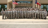 Lackland Airmen selected for promotion to staff sergeant gather for a group photo Aug. 19. (U.S. Air Force photo/Robbin Cresswell)