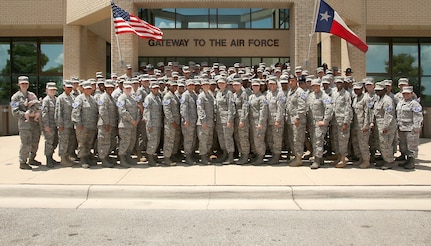 Lackland Airmen selected for promotion to staff sergeant gather for a group photo Aug. 19. (U.S. Air Force photo/Robbin Cresswell)

