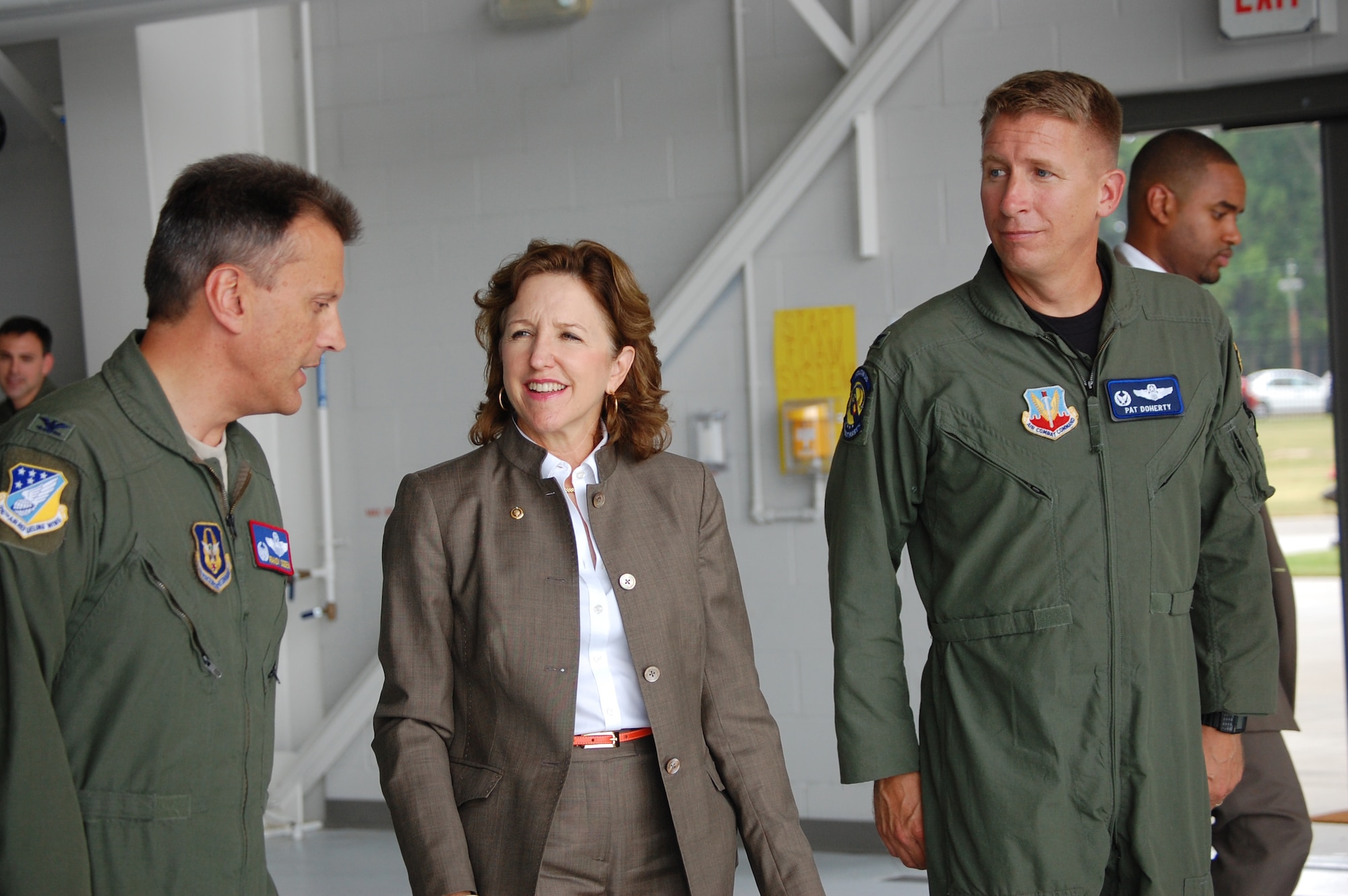 Col. Randy Ogden (left), 916th Air Refueling Wing commander, escorts Senator Kay Hagan, D-N.C., into the 916th's Corrosion Control Hangar along with Col. Patrick Doherty, 4th Fighter Wing commander. (USAF photo by Ms. Donna Lea, 916ARW/PA)