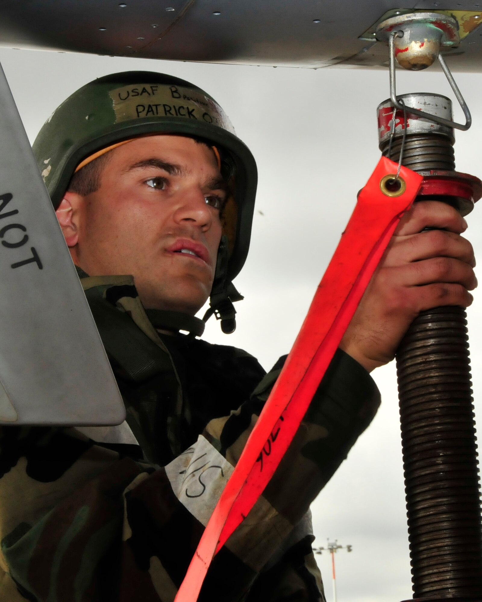 Staff Sgt. Patrick Ott, 48th Aircraft Maintenance Squadron crew chief, jacks up an F-15 for repairs during an operational readiness exercise at RAF Lakenheath, England, Aug. 17. Players are evaluated on their performance under simulated wartime conditions. (U.S. Air Force photo/Airman 1st Class Eboni Knox)