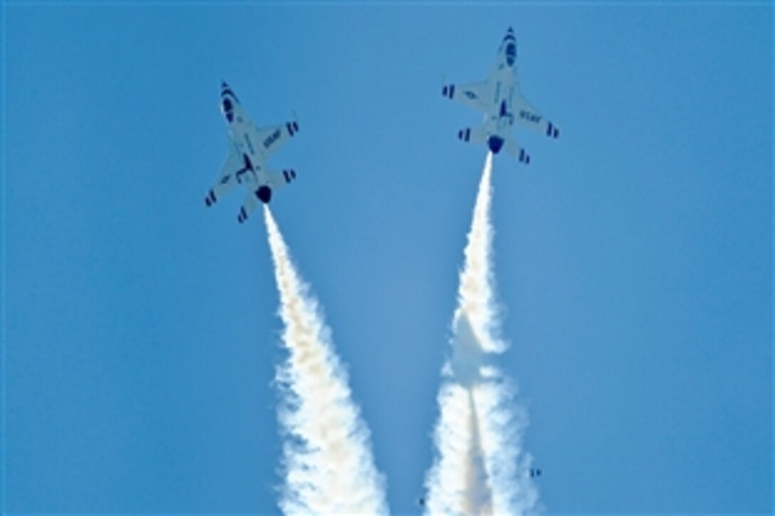 The Thunderbirds, the Air Force's Air Demonstration Squadron, perform the high bomb-burst maneuver during the Abbotsford International Air Show in British Columbia, Aug. 14, 2010.