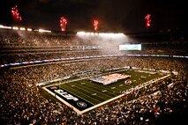 Marines, sailors, Coast Guardsmen, airmen and soldiers unfurled an American flag across the field during a pre-game ceremony before the New York Jets vs. New York Giants game in New Meadowlands Stadium.