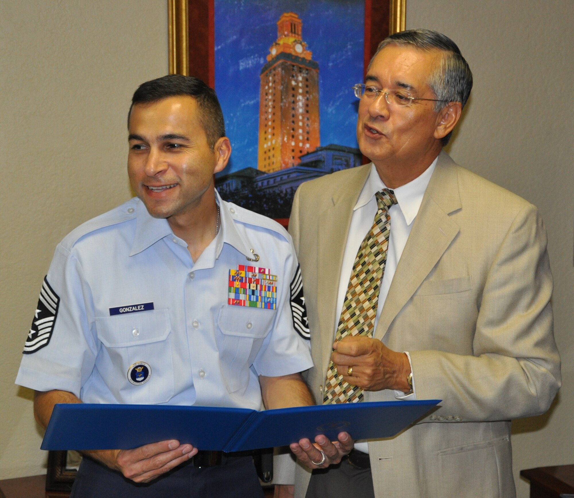 LAUGHLIN AIR FORCE BASE, Texas – Command Chief Master Sgt. Ruben Gonzalez, Air Force Recruiting Service command chief, meets with Del Rio mayor Bobby Fernandez Aug. 19. Chief Gonzalez, who is from Eagle Pass and was recruited into the Air Force out of Del Rio in 1985, chose to begin his world-wide tour of AF recruiting stations with Del Rio. (U.S. Air Force photo by Airman 1st Class Blake Mize)