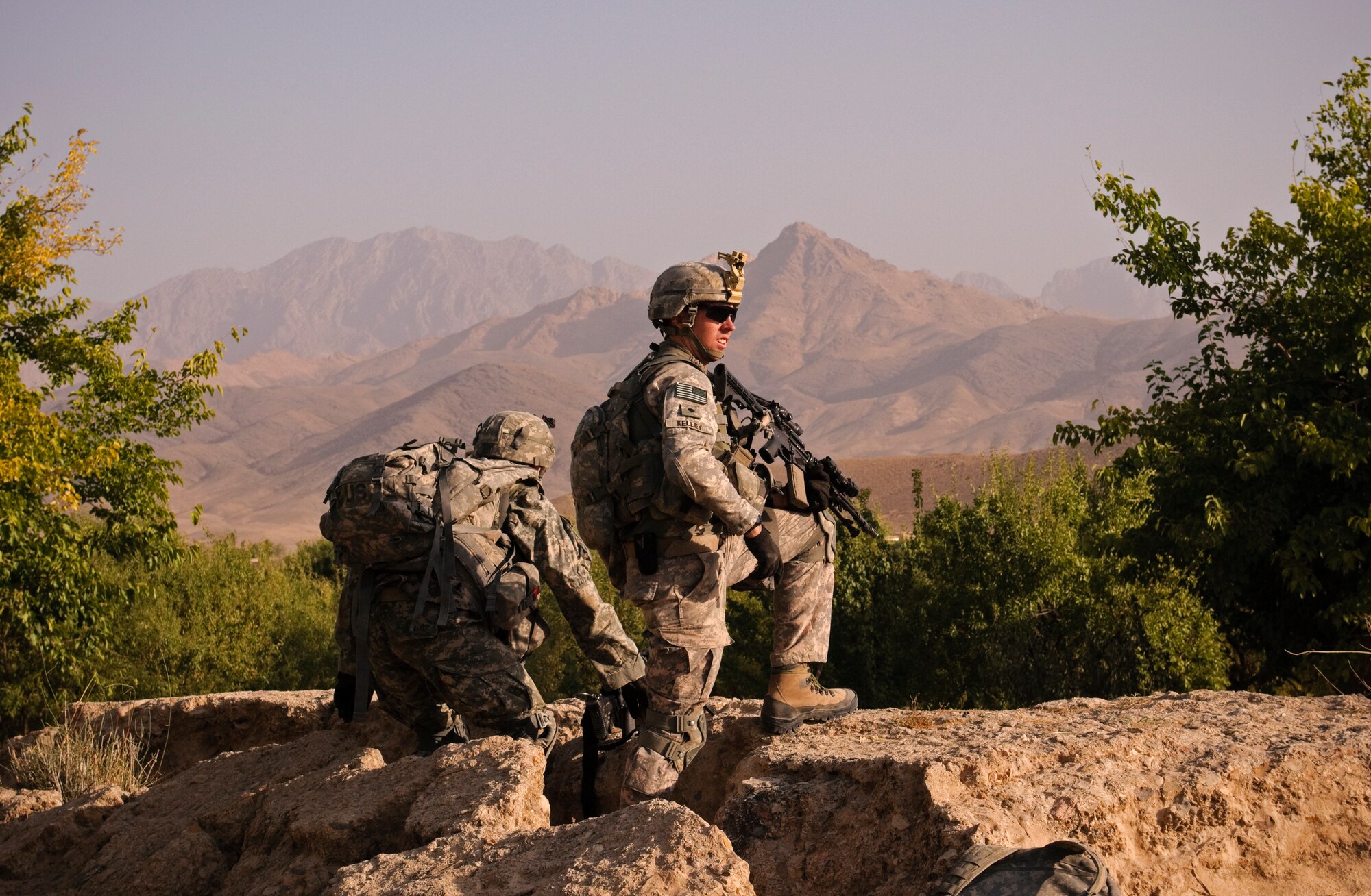 COMBAT OUTPOST MIZAN, Afghanistan - U.S. soldiers assigned to 3rd Platoon, Fox Company, 2nd Squadron, 2nd Stryker Cavalry Regiment, provide security for a meeting in a village near Combat Outpost Mizan, Mizan District, Zabul province, Aug. 19, 2010. Members of Provincial Reconstruction Team Zabul and 3rd Platoon spoke with the local population to assess their needs and inform them of the upcoming provincial parliamentary elections. (U.S. Air Force photo/Senior Airman Nathanael Callon/Released)