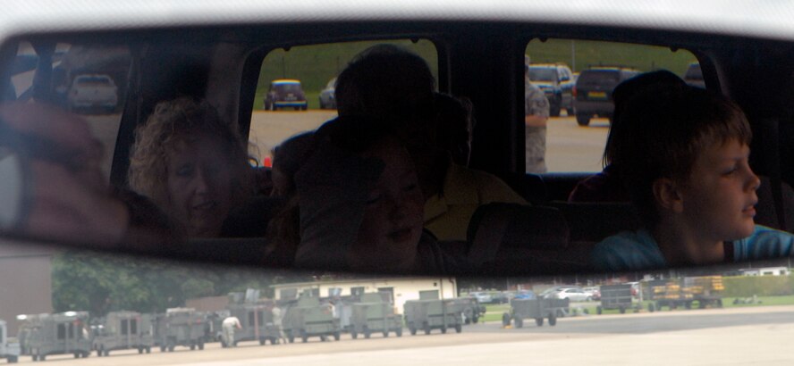 British Nationals prepare to embark on a one-hour guided bus tour of RAF Mildenhall Aug. 21, 2010. The bus tour was also only a small part of the 100th CES's open house where hundreds of British Nationals were invited to attend.  (U.S. Air Force photo/Tech. Sgt. Kevin Wallace)